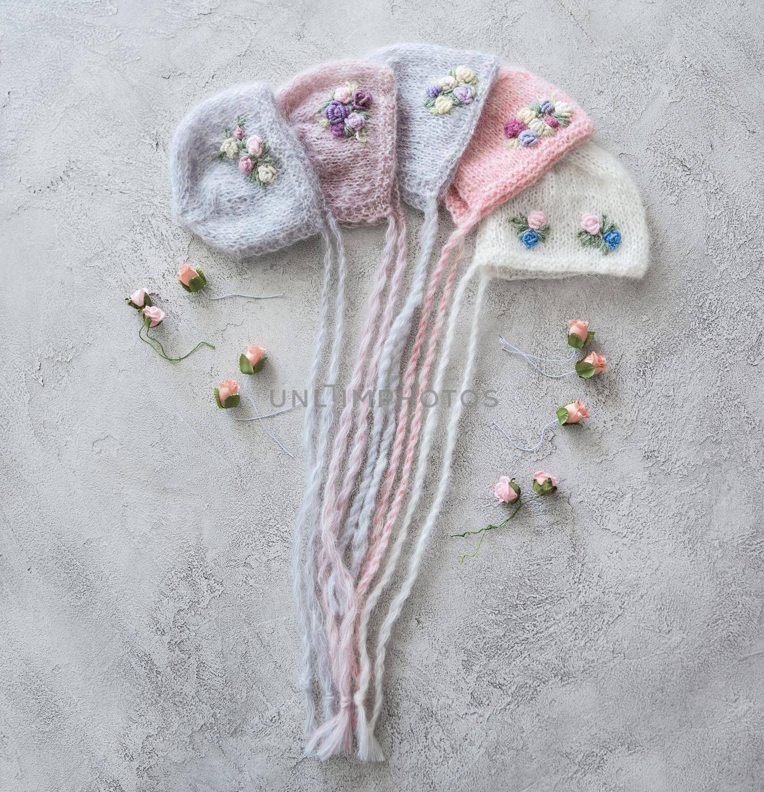 set of tender knitted hats for newborn. props for photo sessions