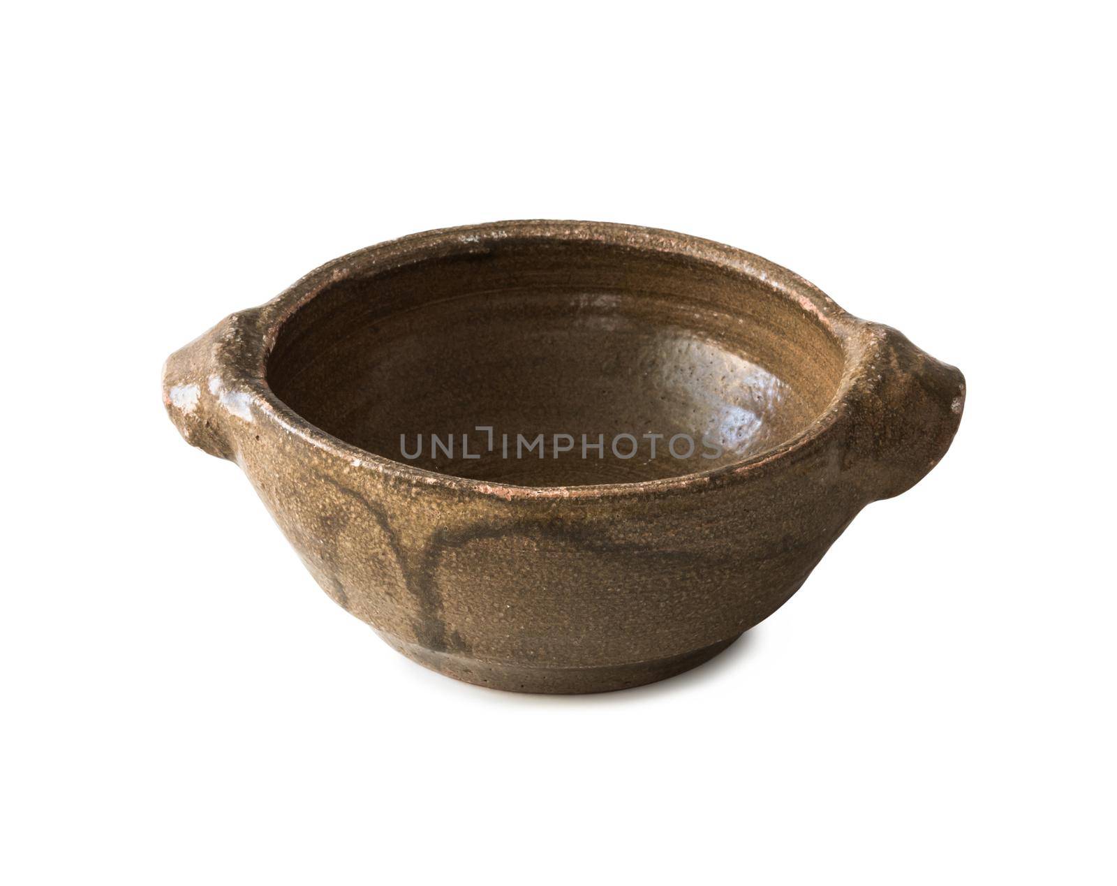 old empty clay bowl isolated on white background