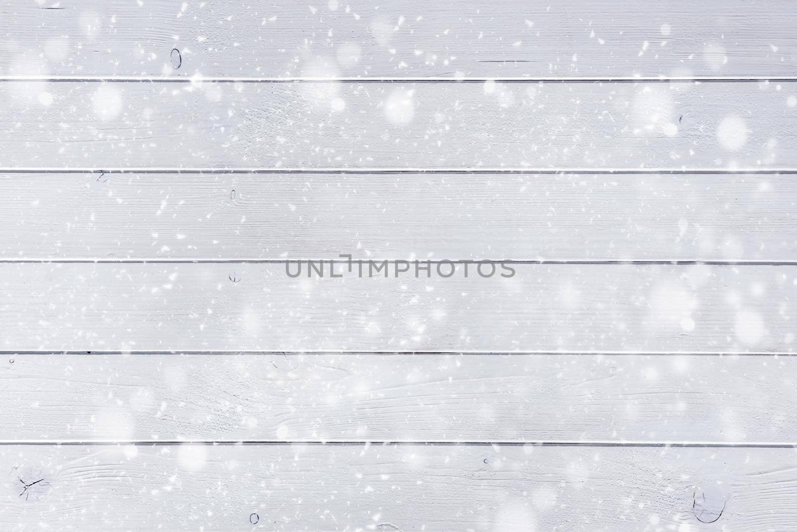 white wooden planks under the snow like a beautiful christmas background