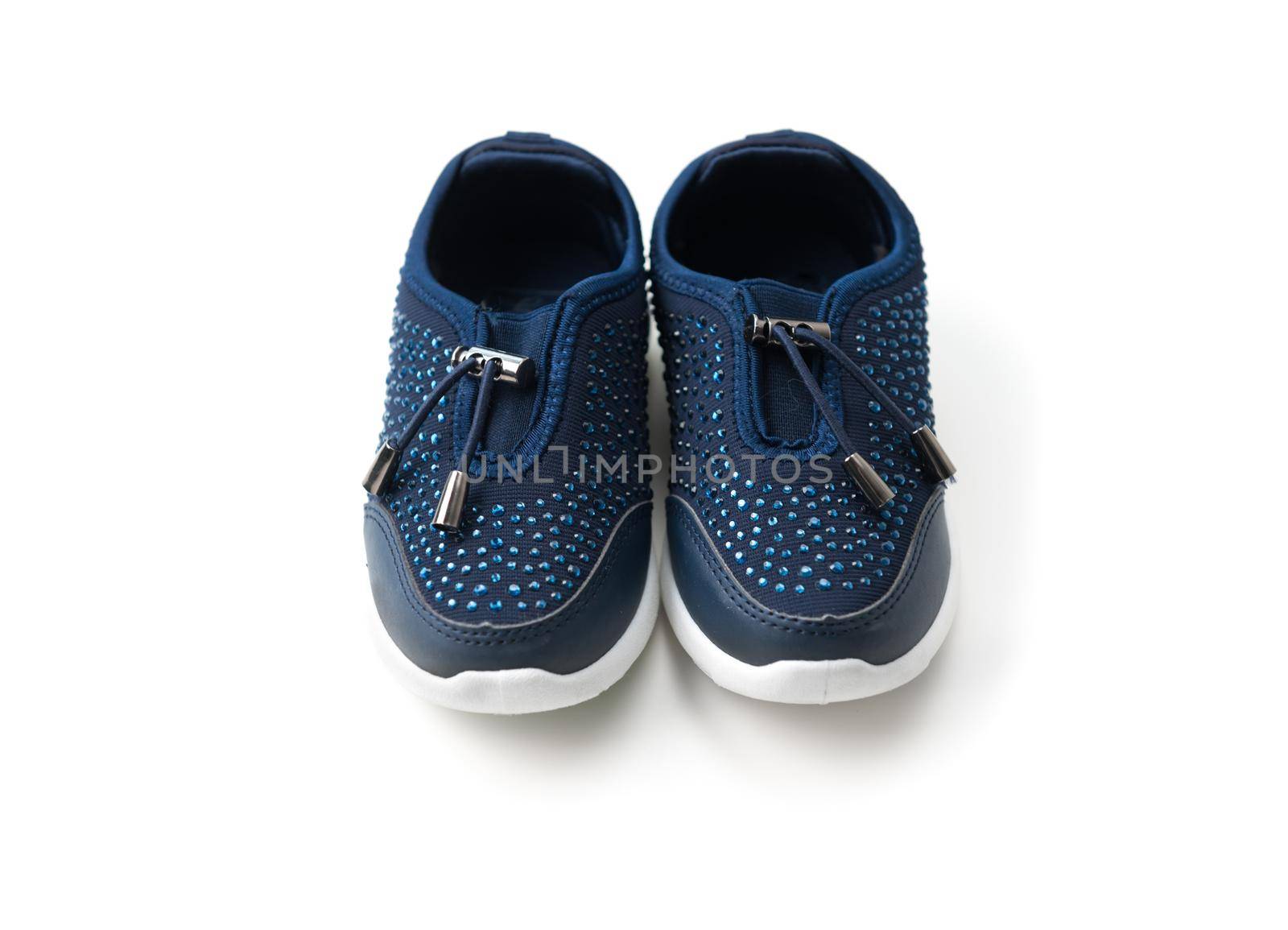 Dark blue sneakers with deep blue stones, white soles, comfy for running isolated on white background