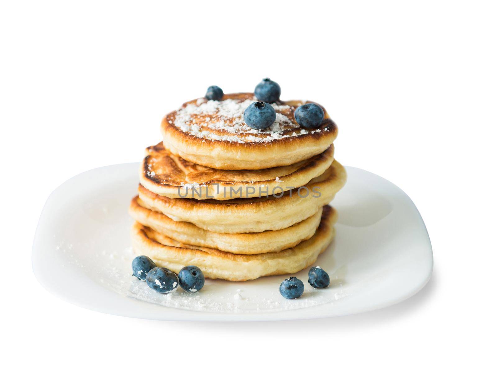 traditional russian puncakes with blueberry isolated on white background