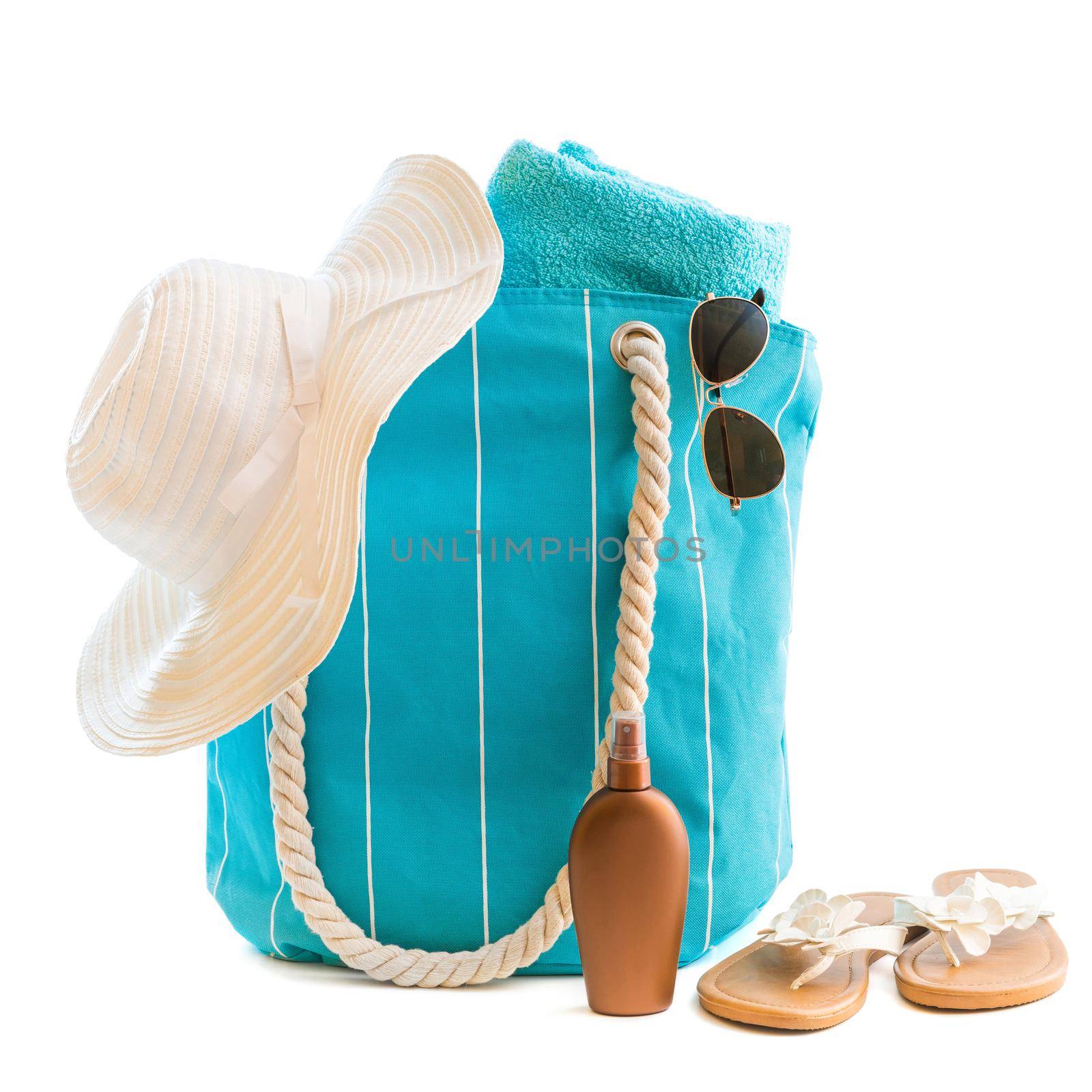 bag with beach accessories isolated on a white background