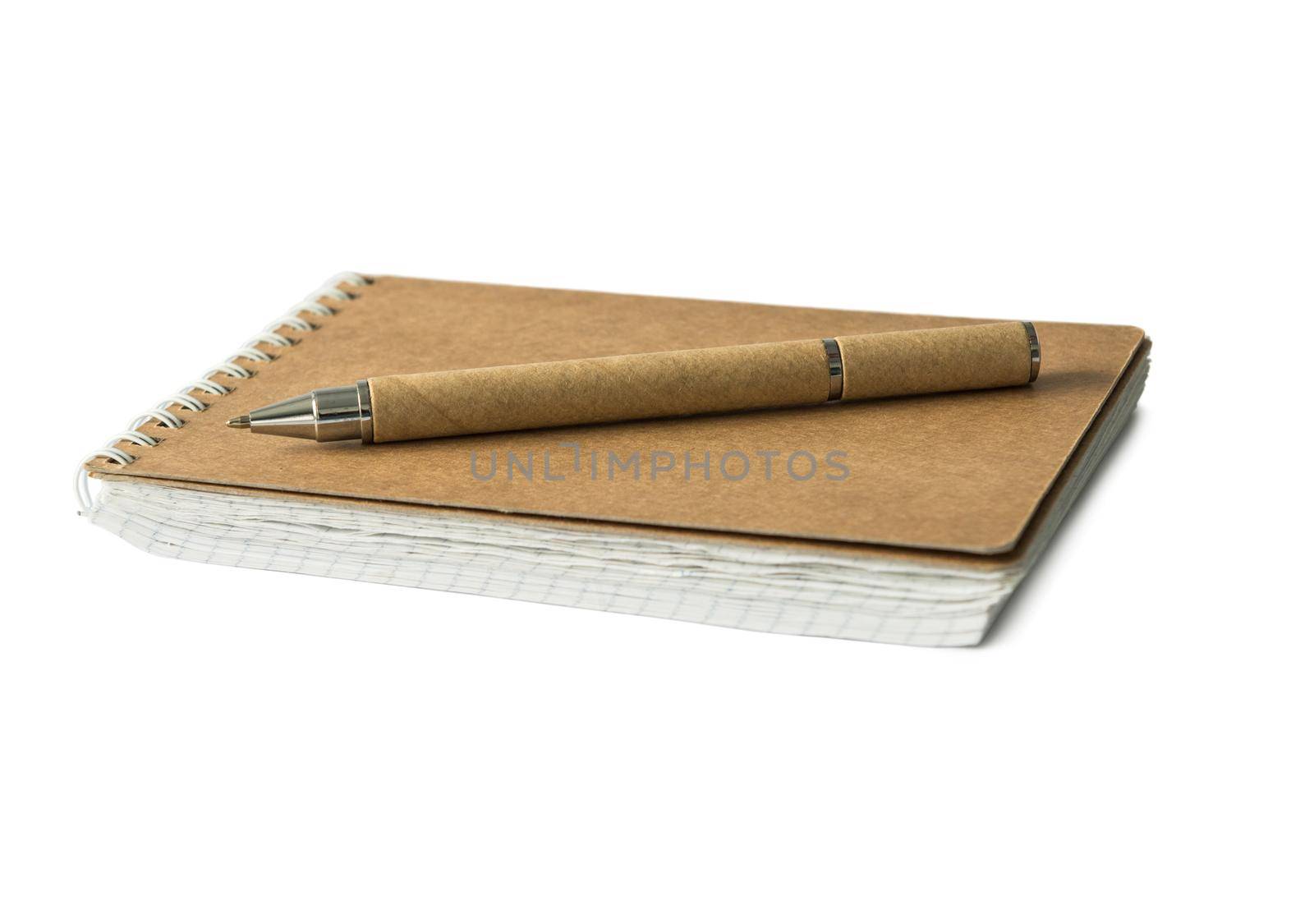 eco notebook and pen with carton covers isolated on white background
