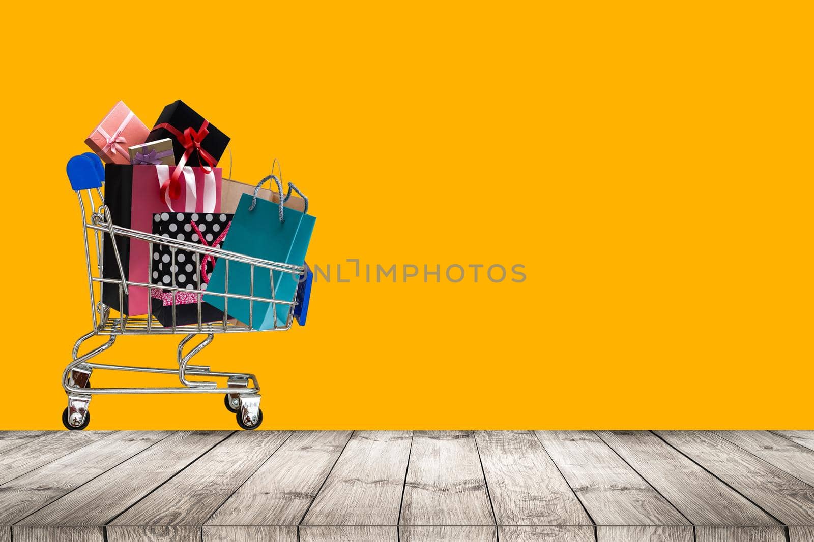 Empty wooden table gifts background. Flat lay view, copy space