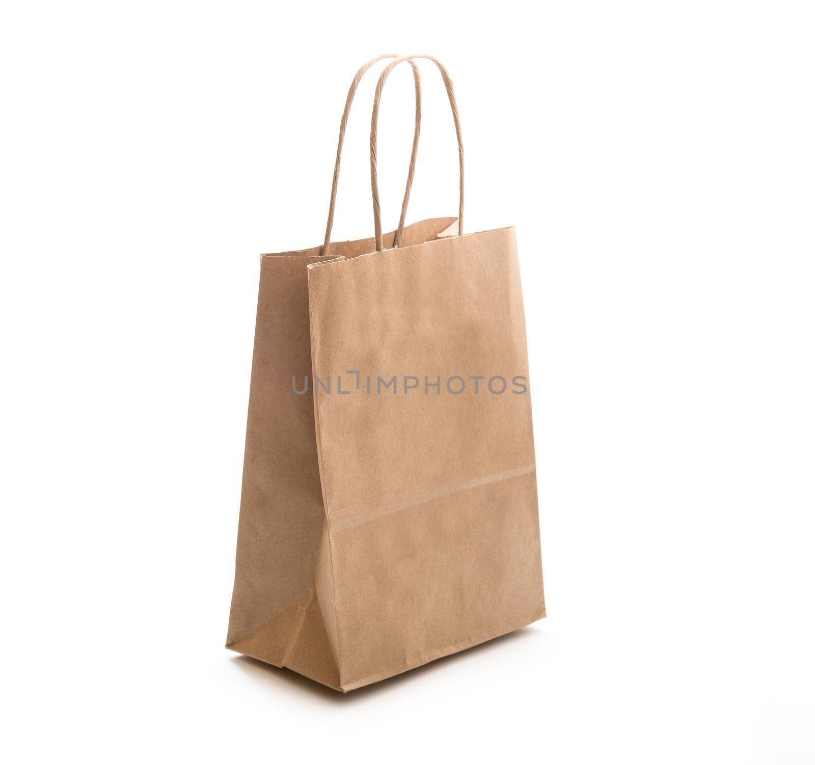 Brown paper bag on white background