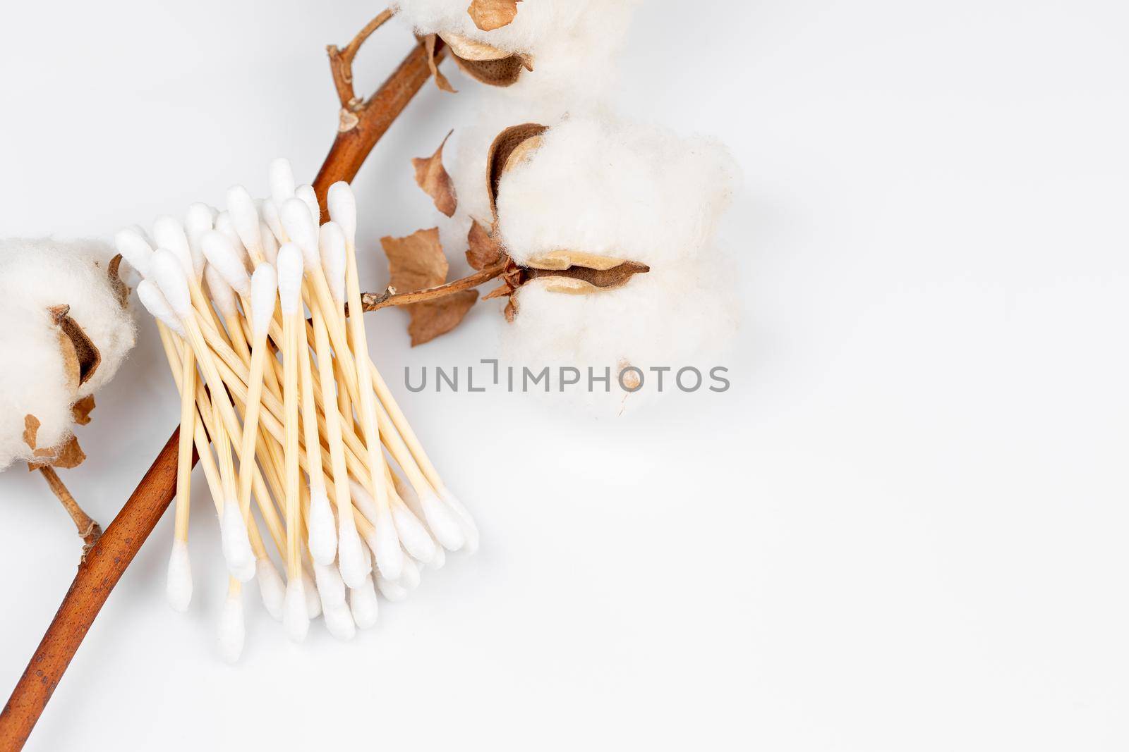 Zero waste bamboo cotton swabs on grey background by Syvanych