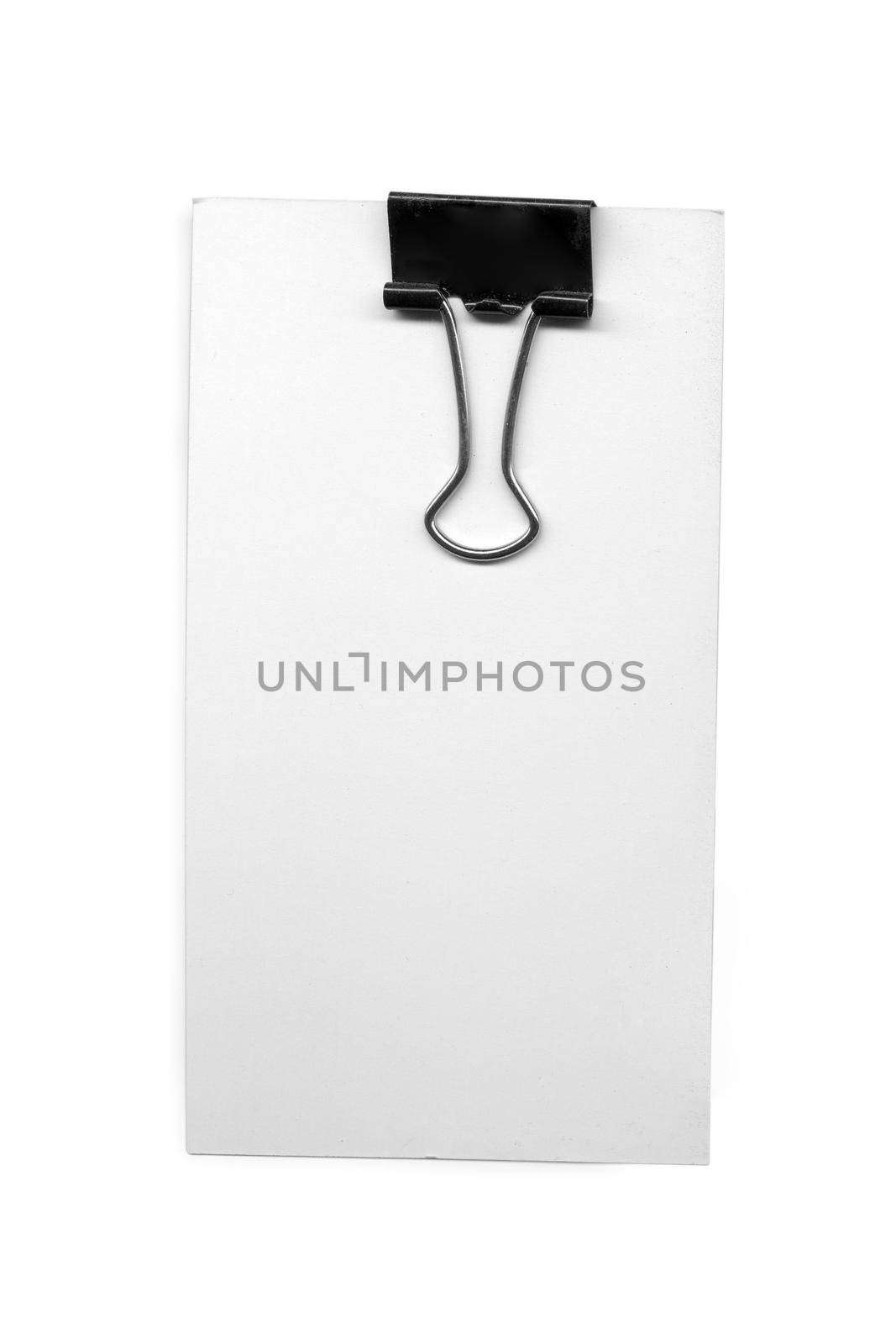 Blank paper with paper clip isolated in white background