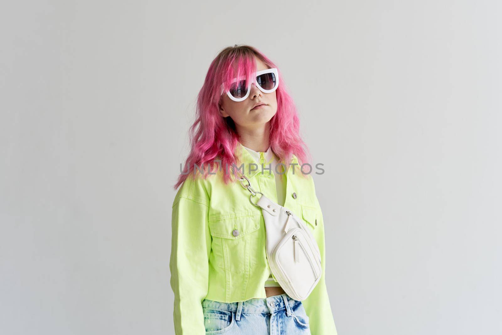woman with pink hair teen fashionable clothes posing neon. High quality photo