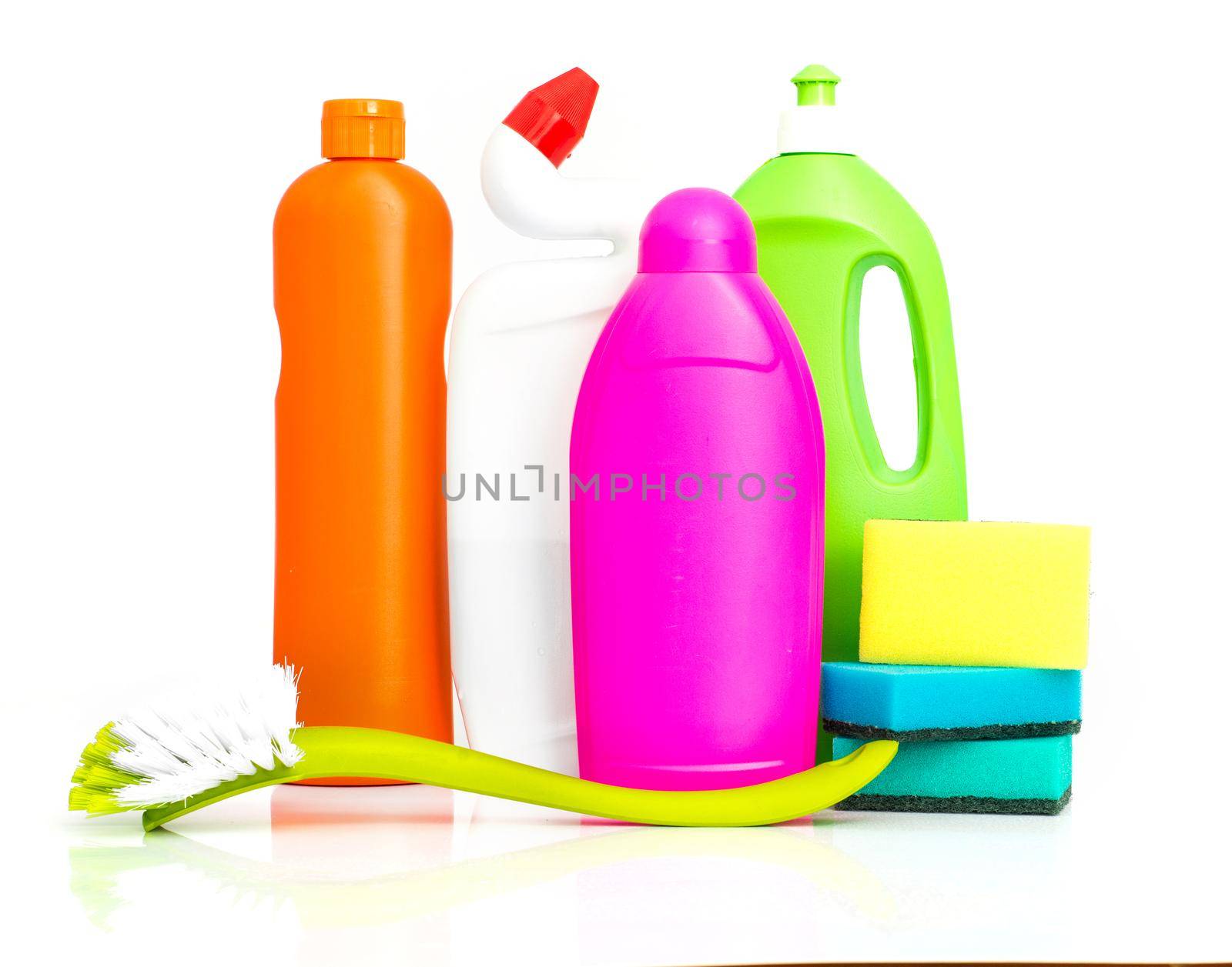 cleaning supplies and sponges on white background