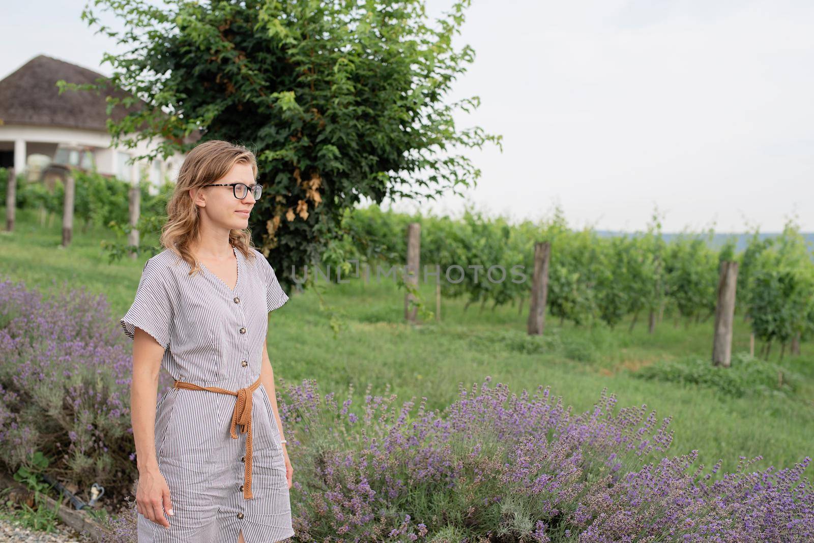 Woman walking by the lavender field