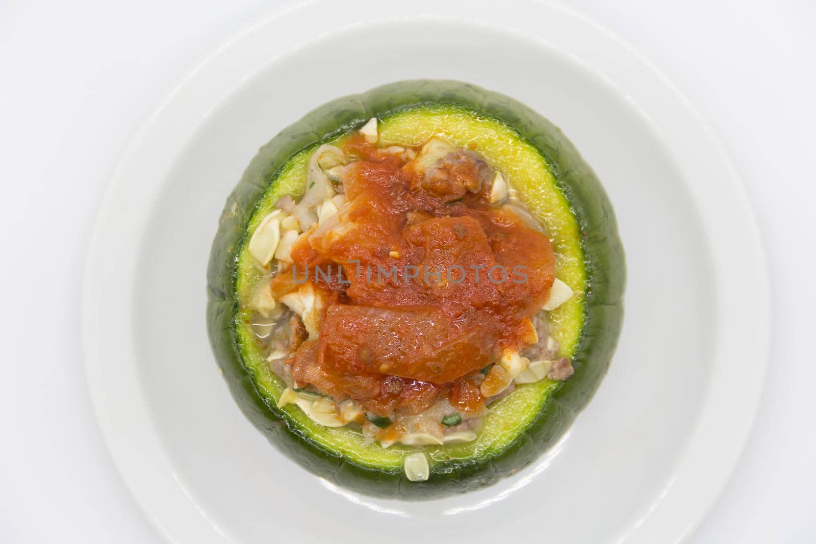zucchini stuffed with meat and a variety of sauces