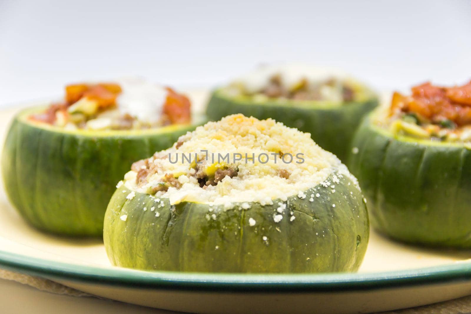 zucchini stuffed with meat and a variety of sauces by GabrielaBertolini