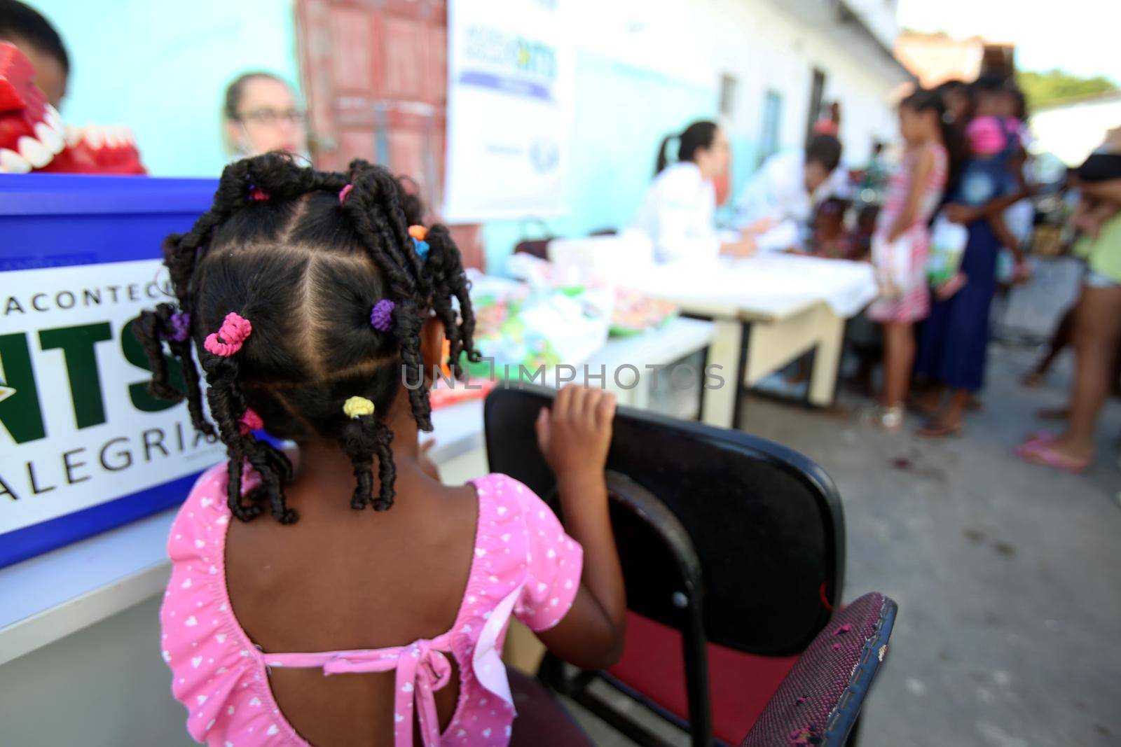 salvador, bahia, brazil - october 20, 2017:  dentita is tested in children's teething during social action in a daycare center in the city of Salvador.
