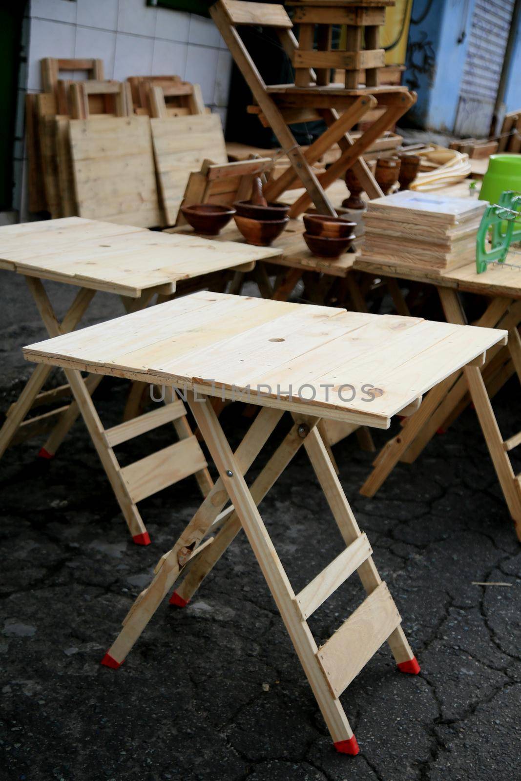 salvador, bahia, brazil - july 6, 2021: Table made of demolition wood is seen for sale in Salvador city.