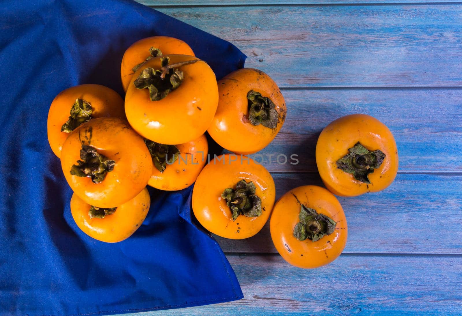 organic and fresh persimmon fruits to prepare jams by GabrielaBertolini