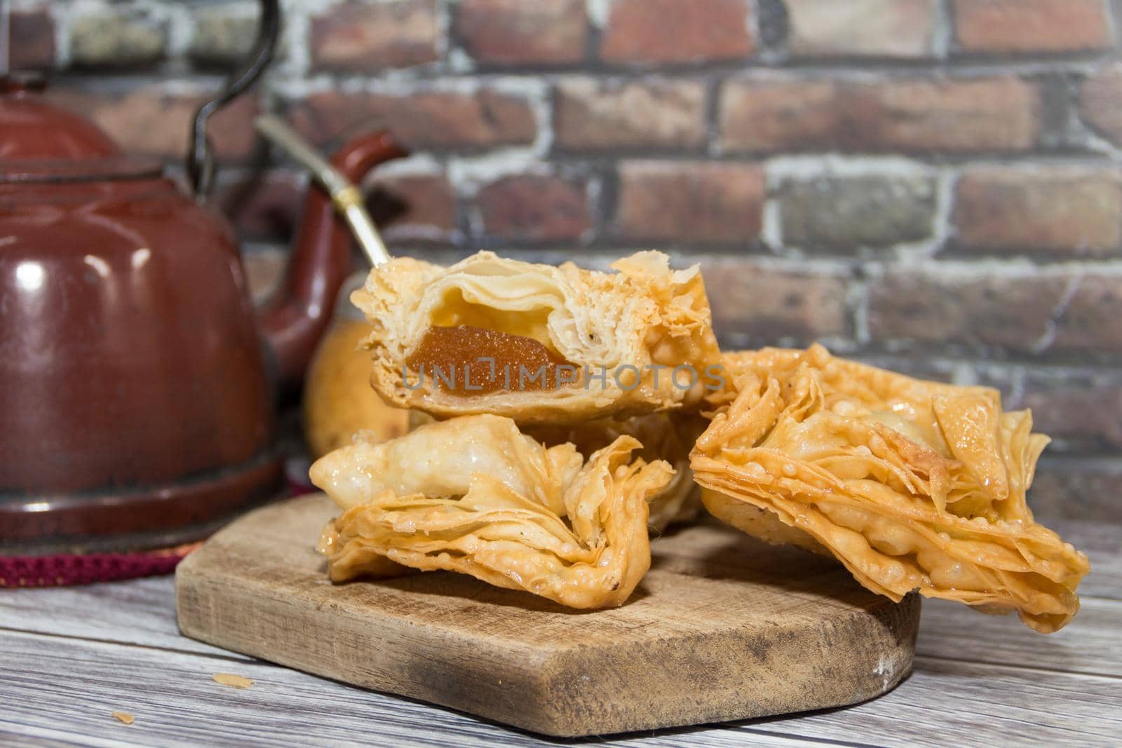 Plate of fried sweet potato and quince pastries. traditional in the Argentine national holidays