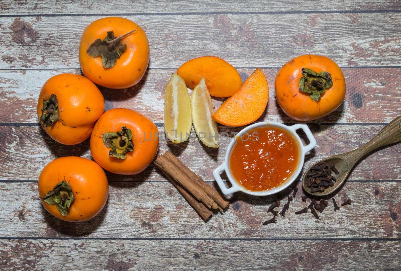 organic and fresh persimmon fruits to prepare jams by GabrielaBertolini