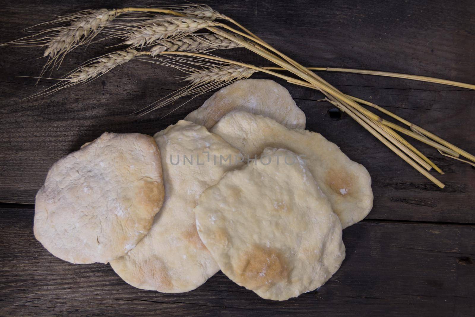 unleavened or unleavened bread, traditional of the Hebrew culture made without yeast, symbol of the Jewish Passover by GabrielaBertolini