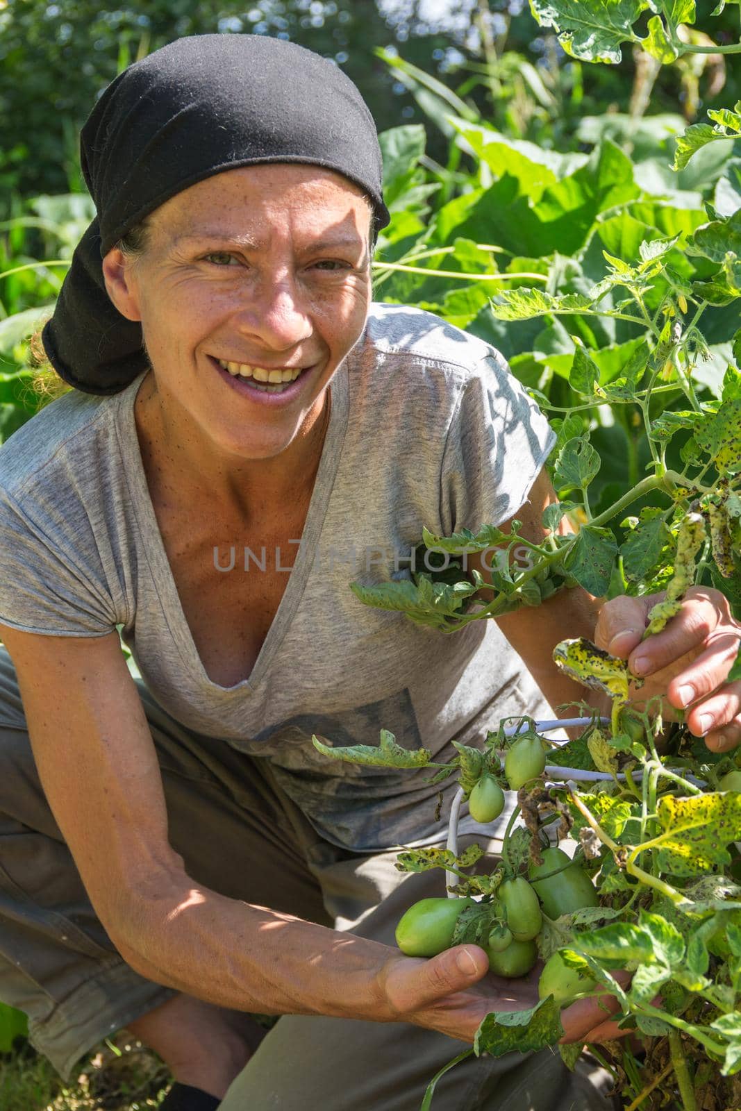 rural working woman in the vegetable garden