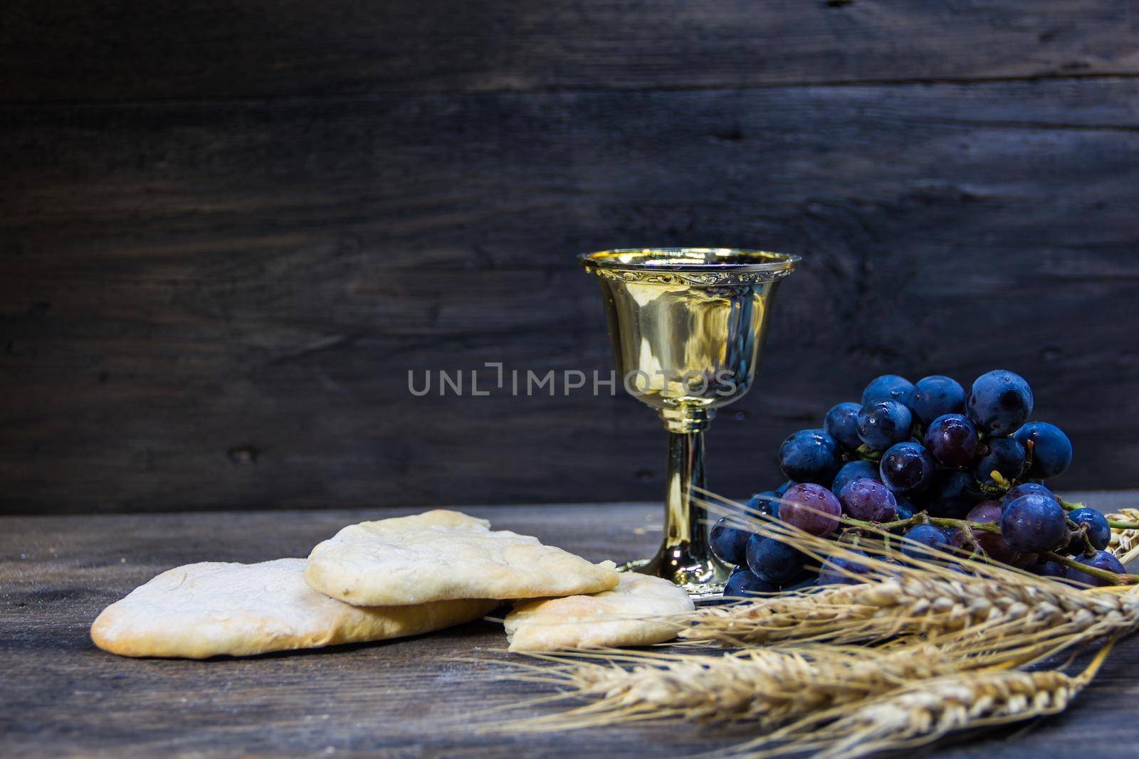 sour bread, wine, grapes and wheat symbol of Christian communion by GabrielaBertolini