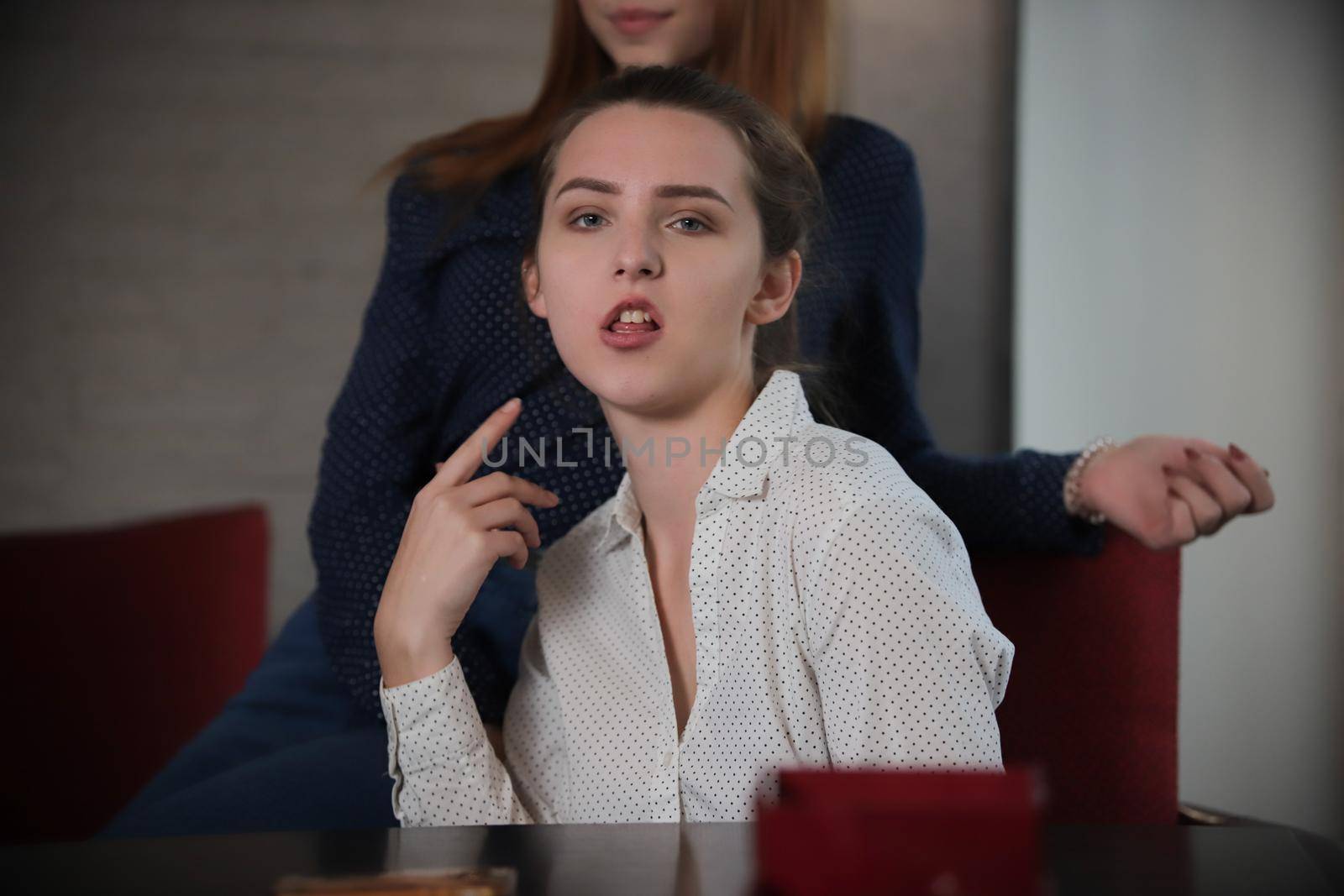 Portrait of young woman with funny face. Close up