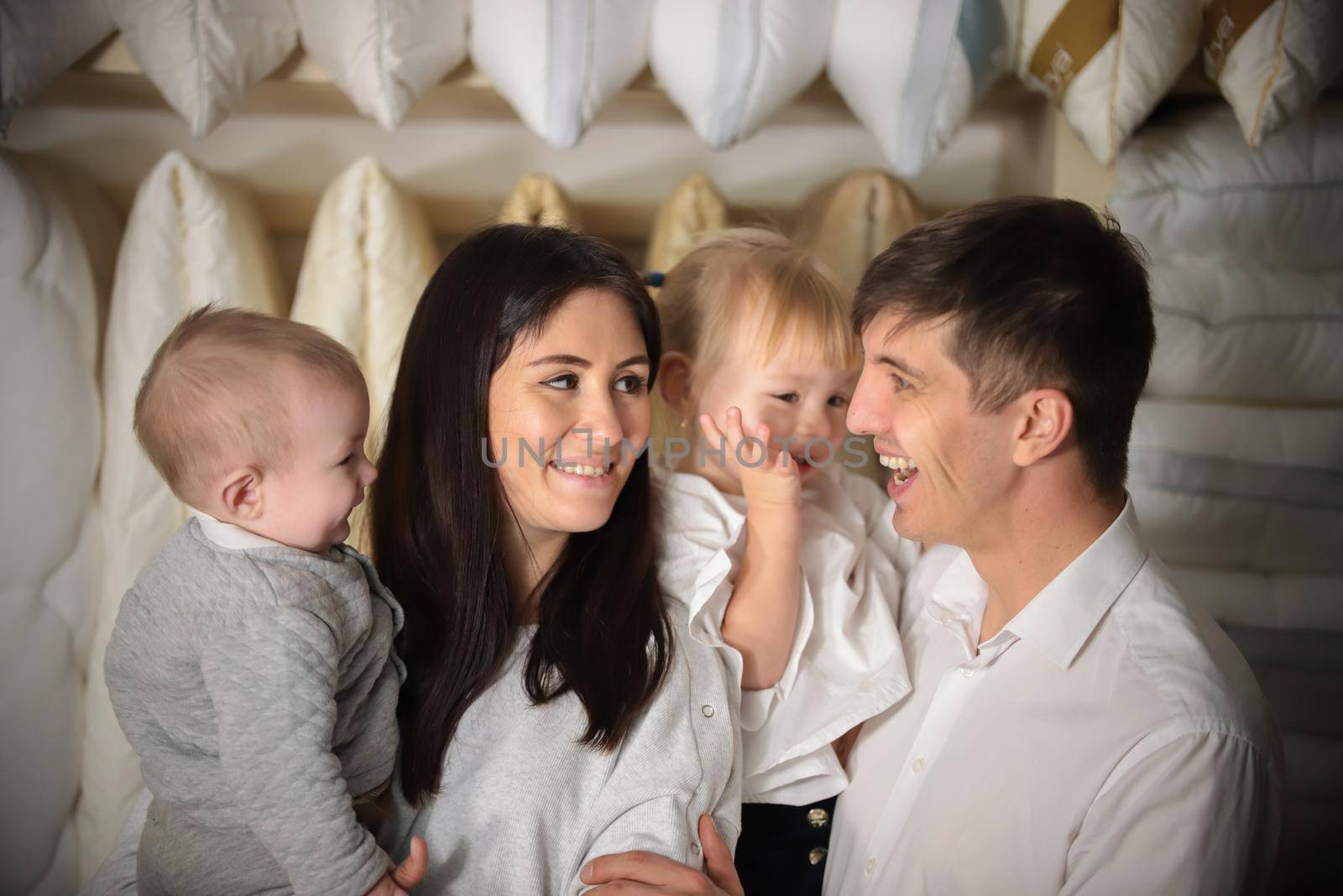 Young family on shopping. Portrait of whole family, smiling. Happiness. Close up