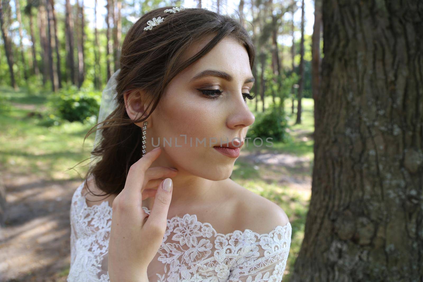 Wedding photography in rustic style emotions of the bride on the nature on the rocks. by lunarts