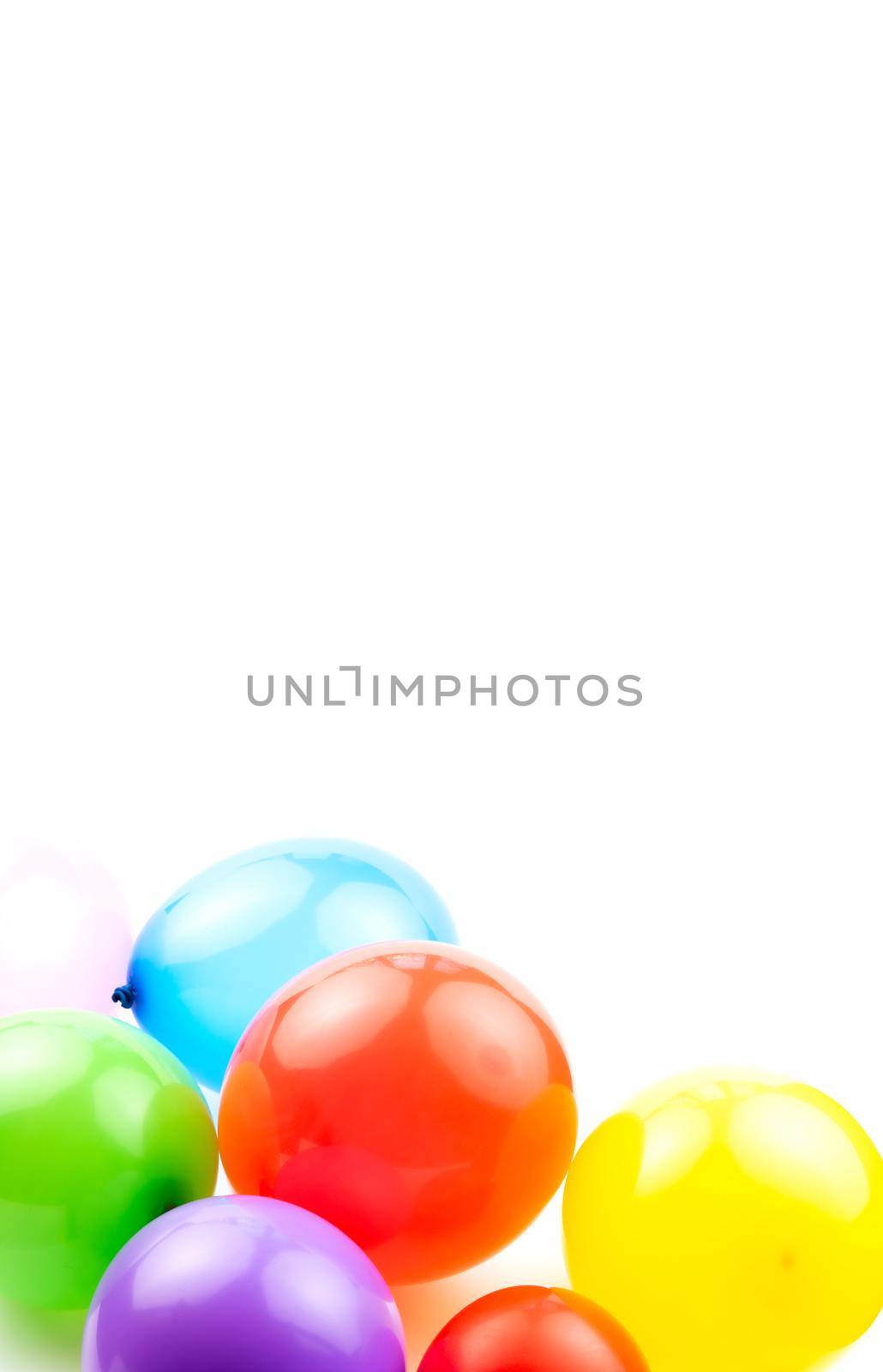 Colored birthday balloons isolate on a white background with space for your text by lunarts