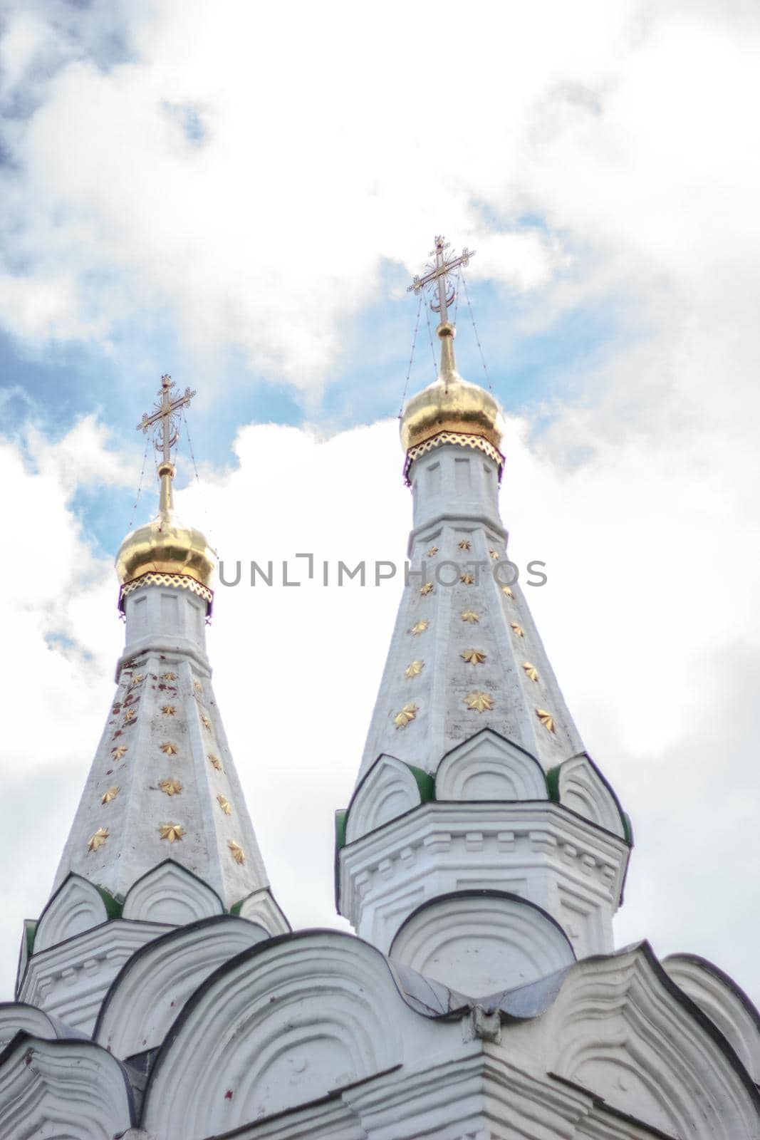 Domes of orthodox church in a Russia against blue sky