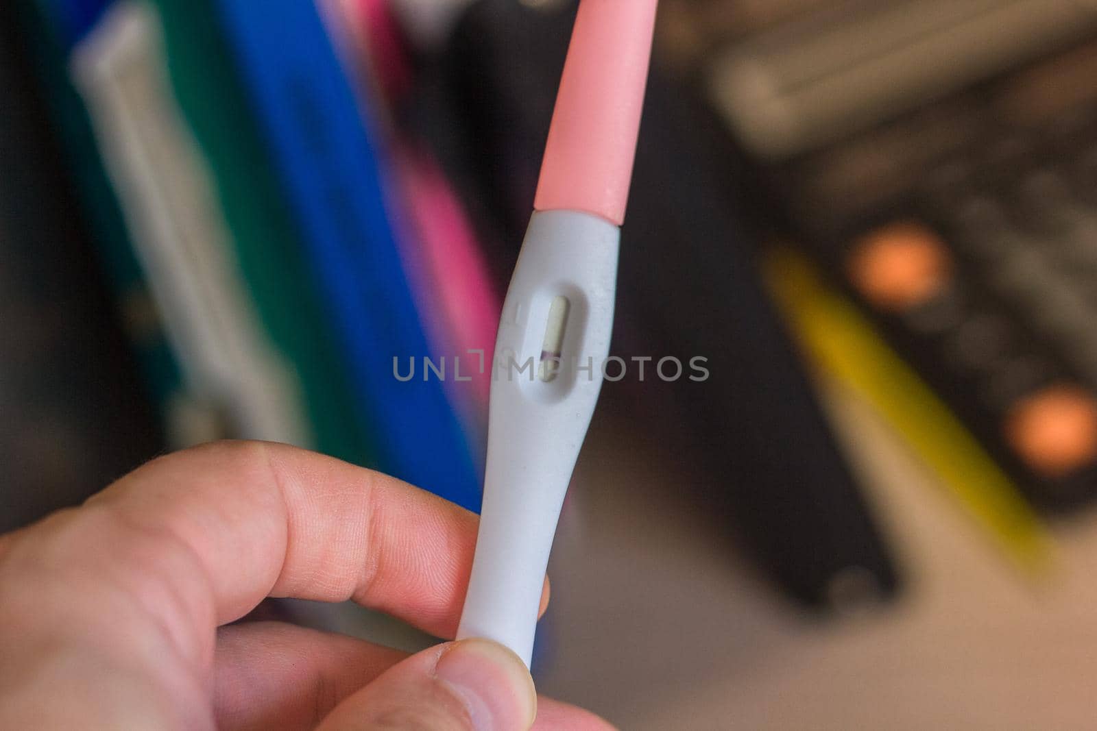 Negative pregnancy test in a human hand