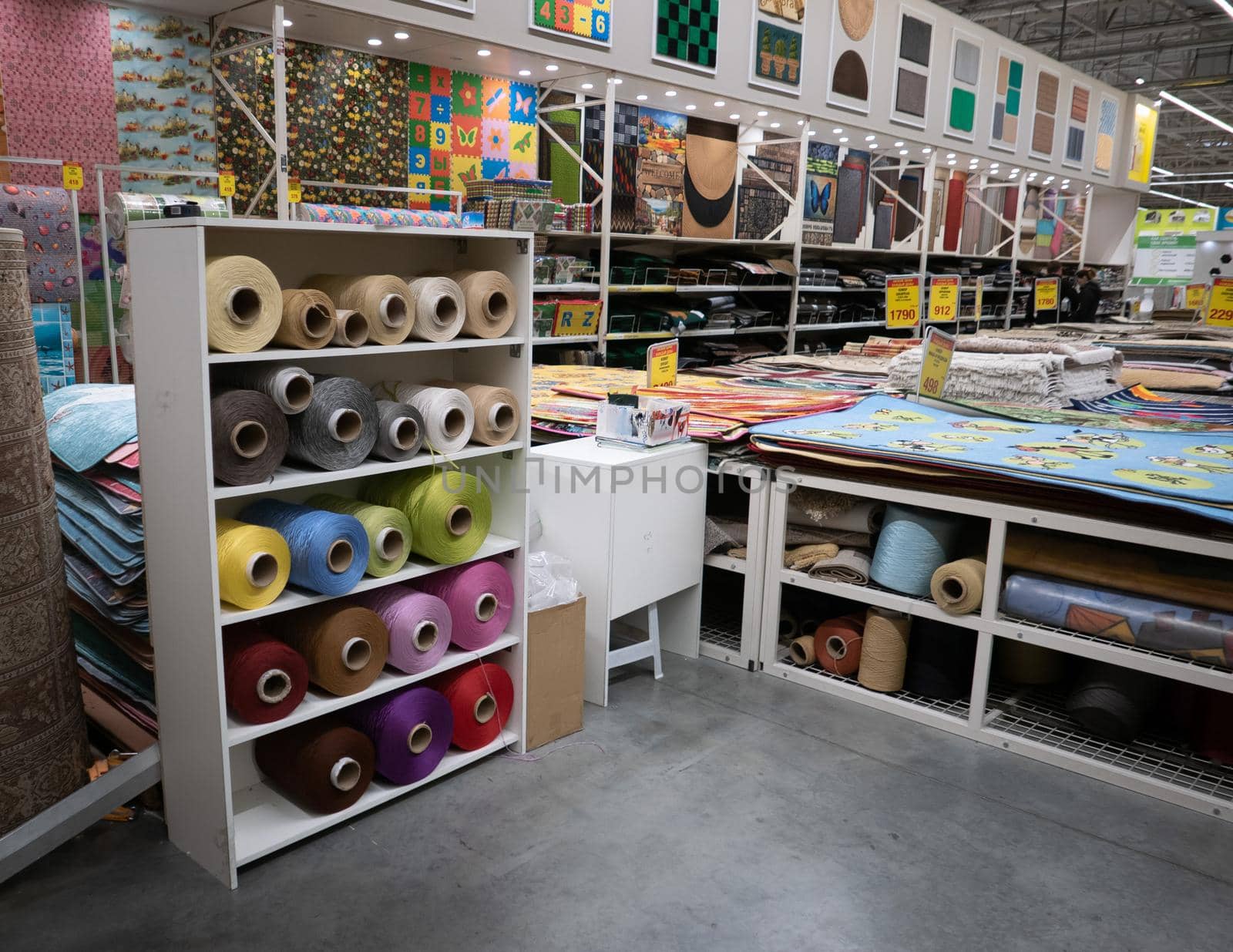 Big sewing rolls in a carpet mall.