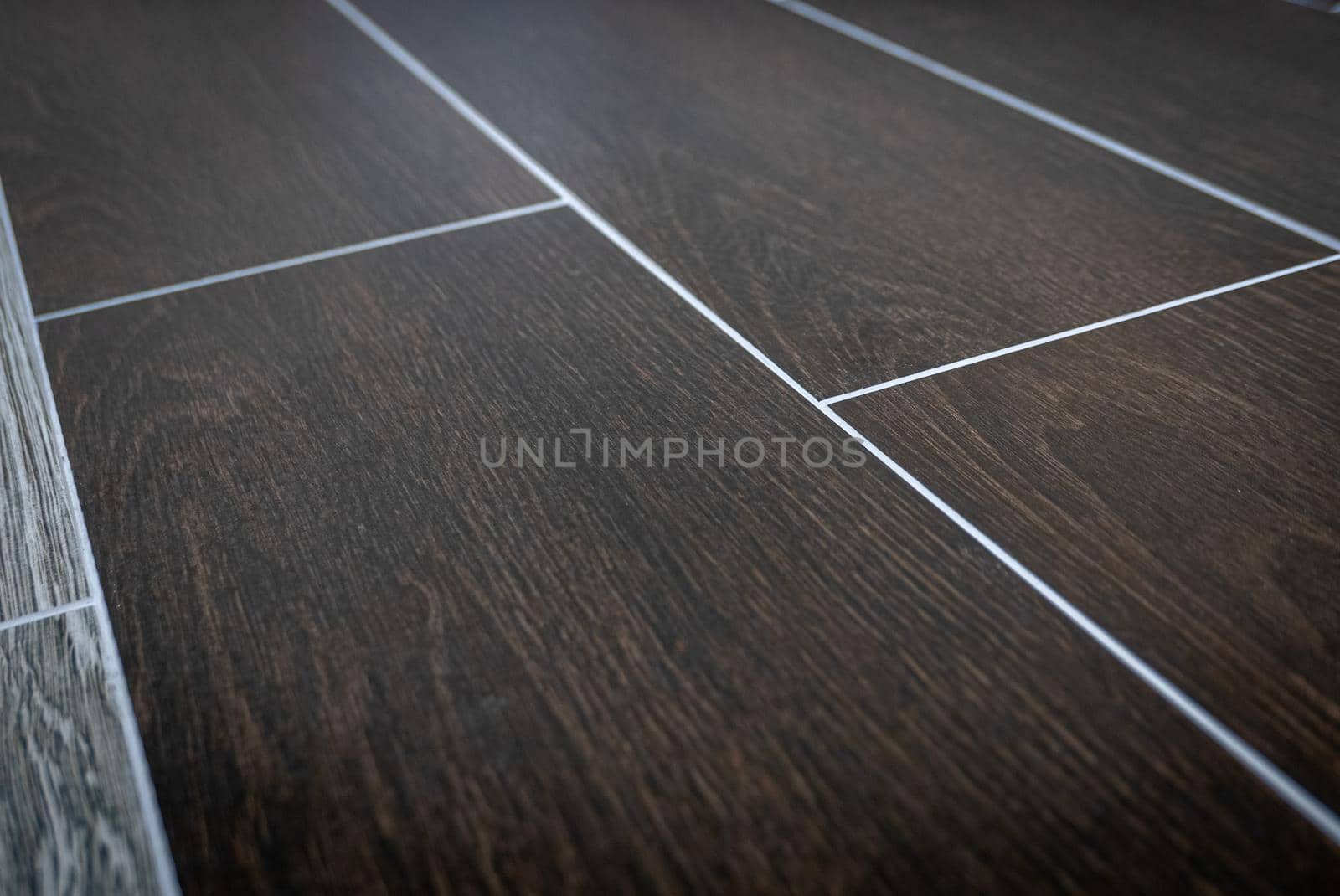Ceramic tiles flooring - texture of natural ceramic floor decorating as wood.