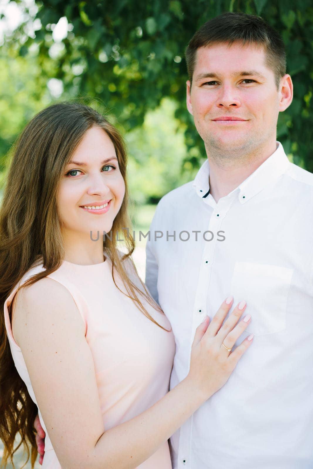 Young lovely couple at the nature park