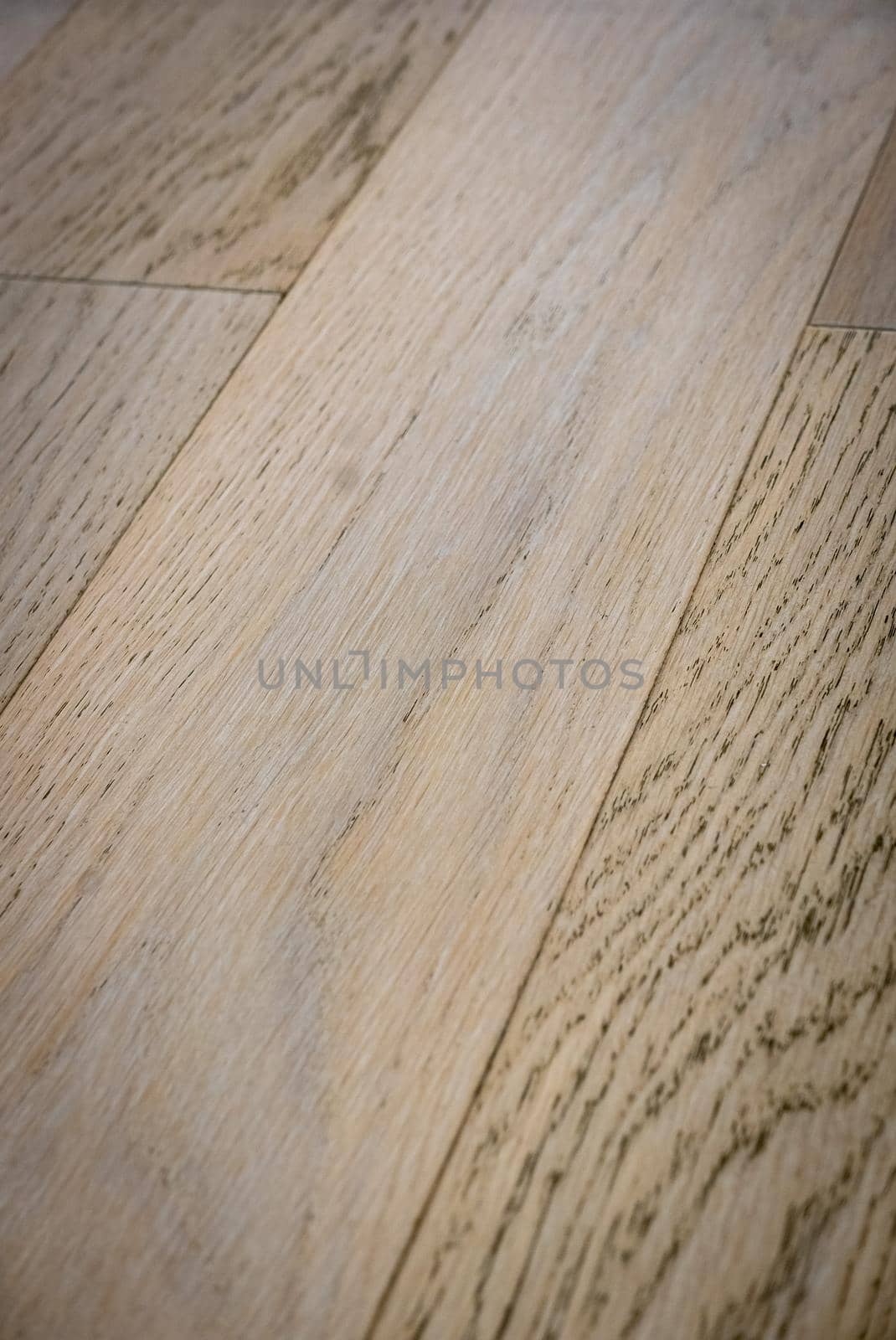 Dark brown wooden parquet floor texture as background.