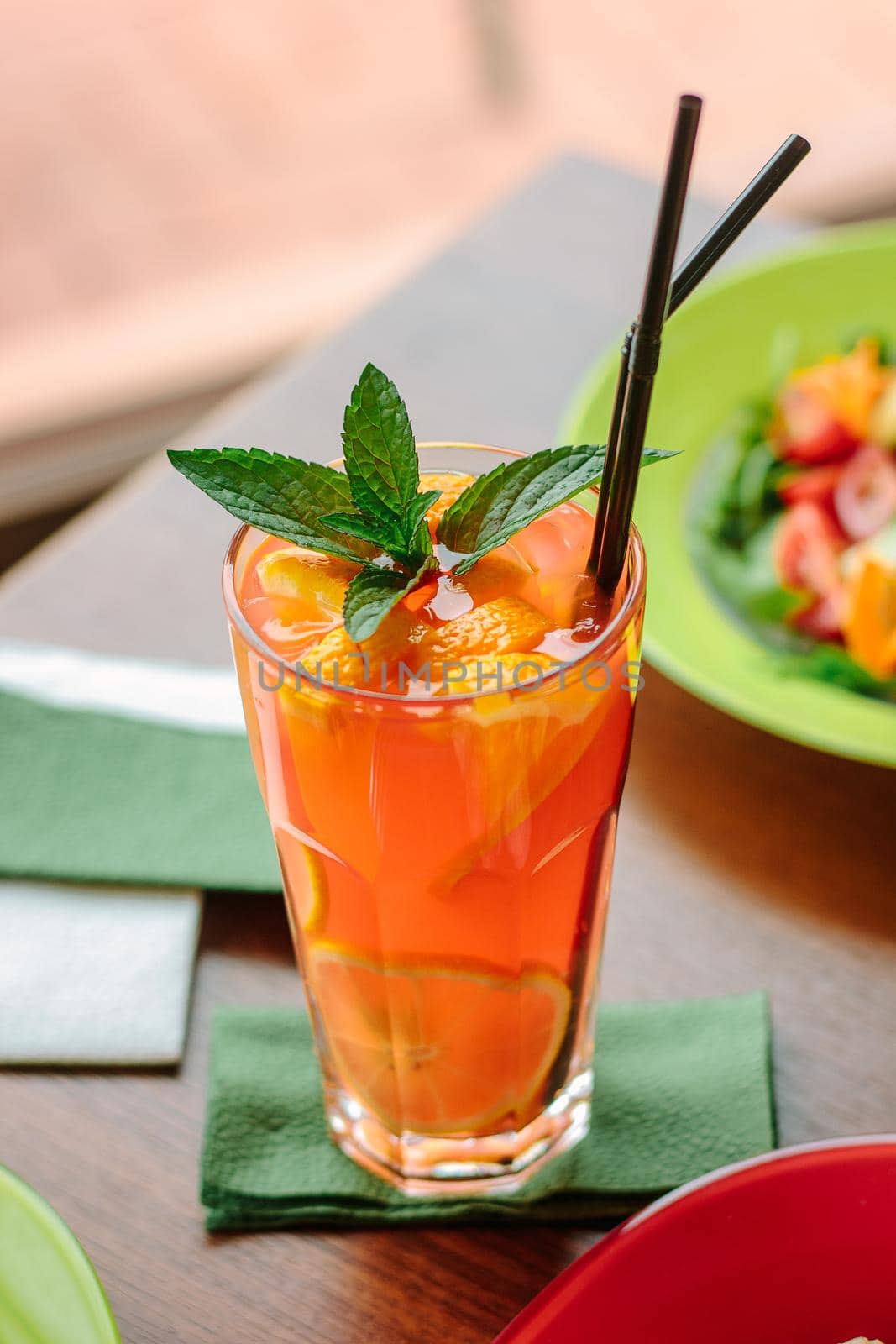 Fresh lemonade with citrus fruits and mint, great image for your needs.