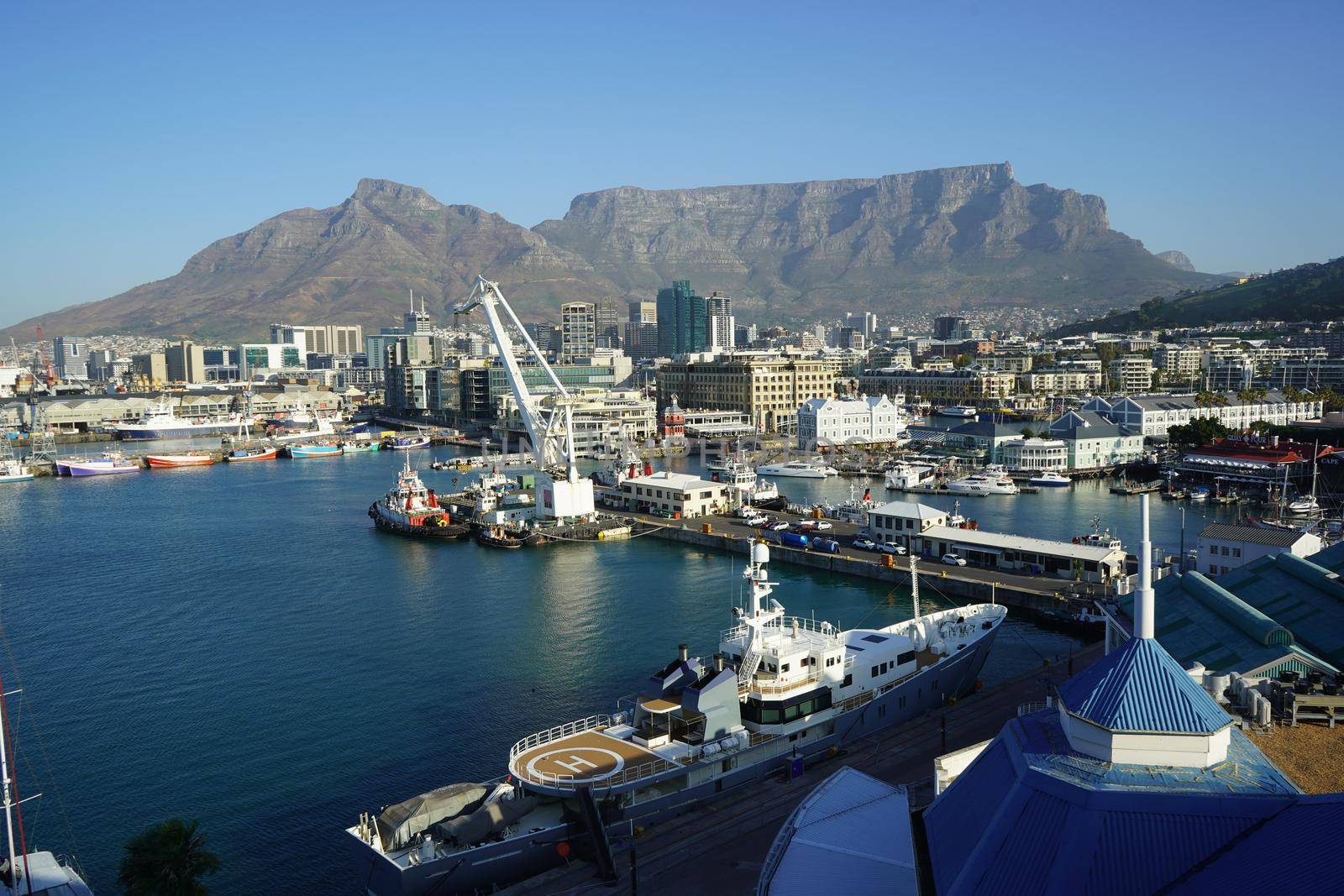 V and A waterfront and Table Mountain, in Cape Town, South Africa by fivepointsix