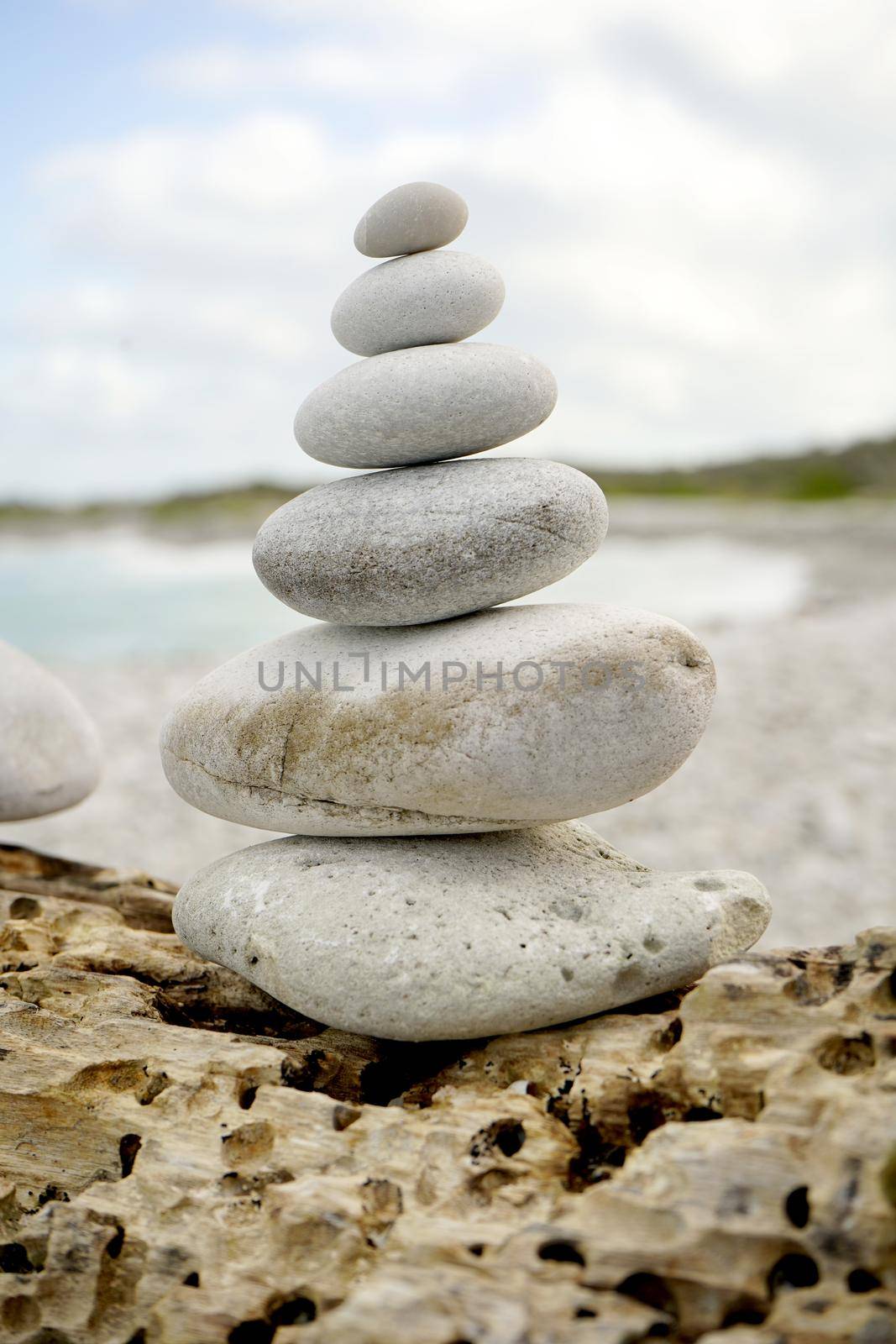 Stack of pebbles balancing, zen concept by fivepointsix