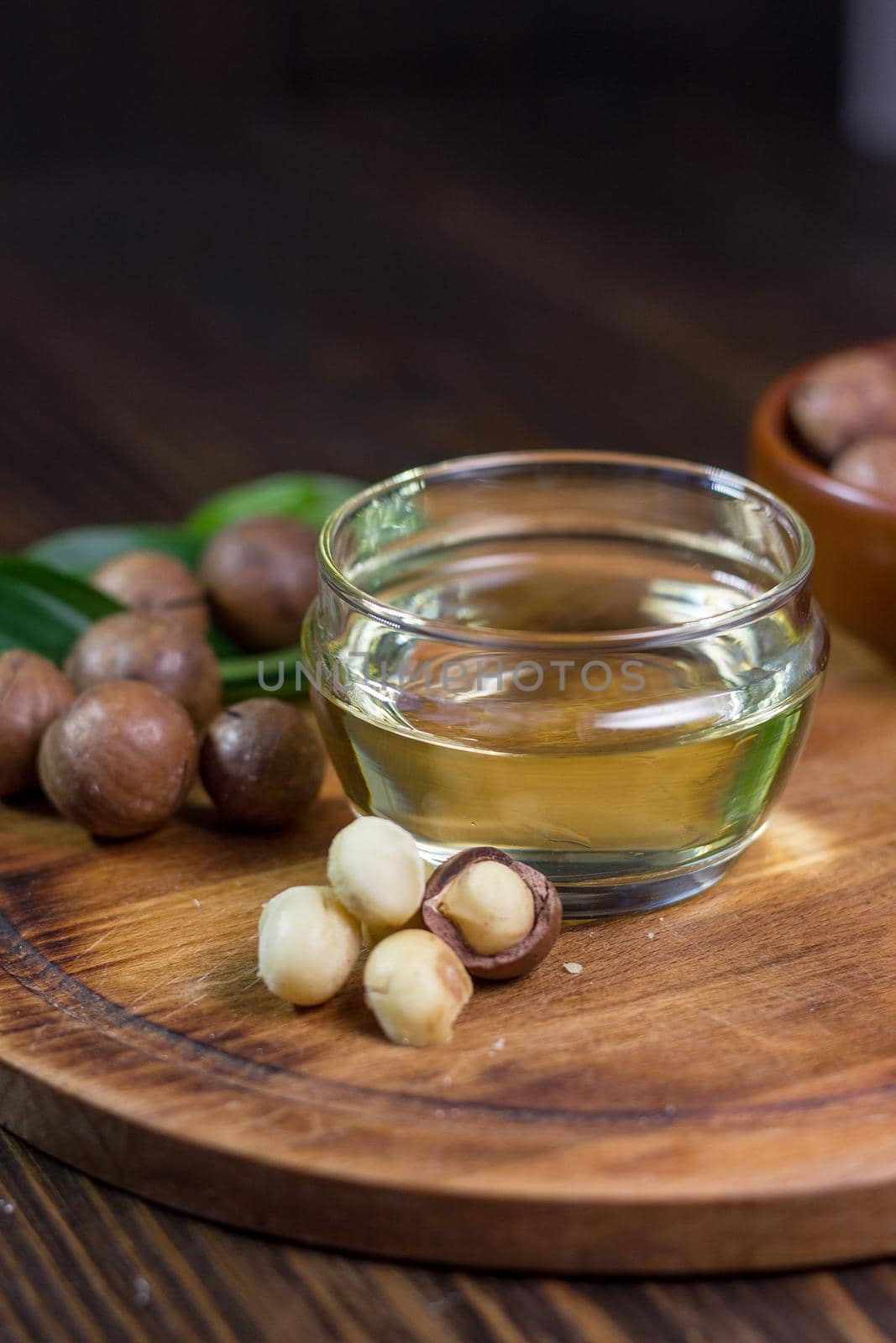 Macadamia nuts neat the can with macadamia oil. Great photo for your needs.