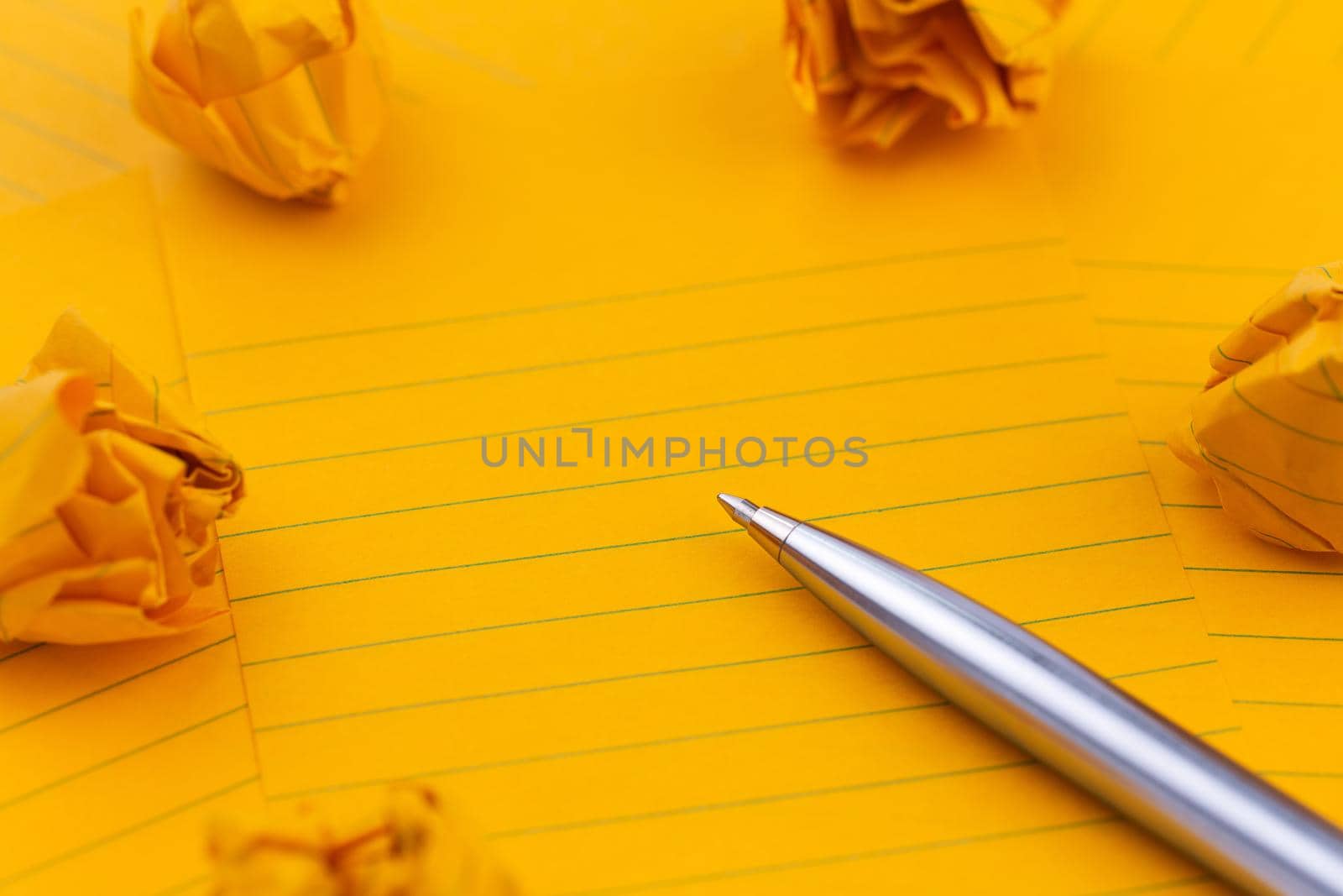 Concept Orange sheets of paper, pen and empty space for your text by lunarts