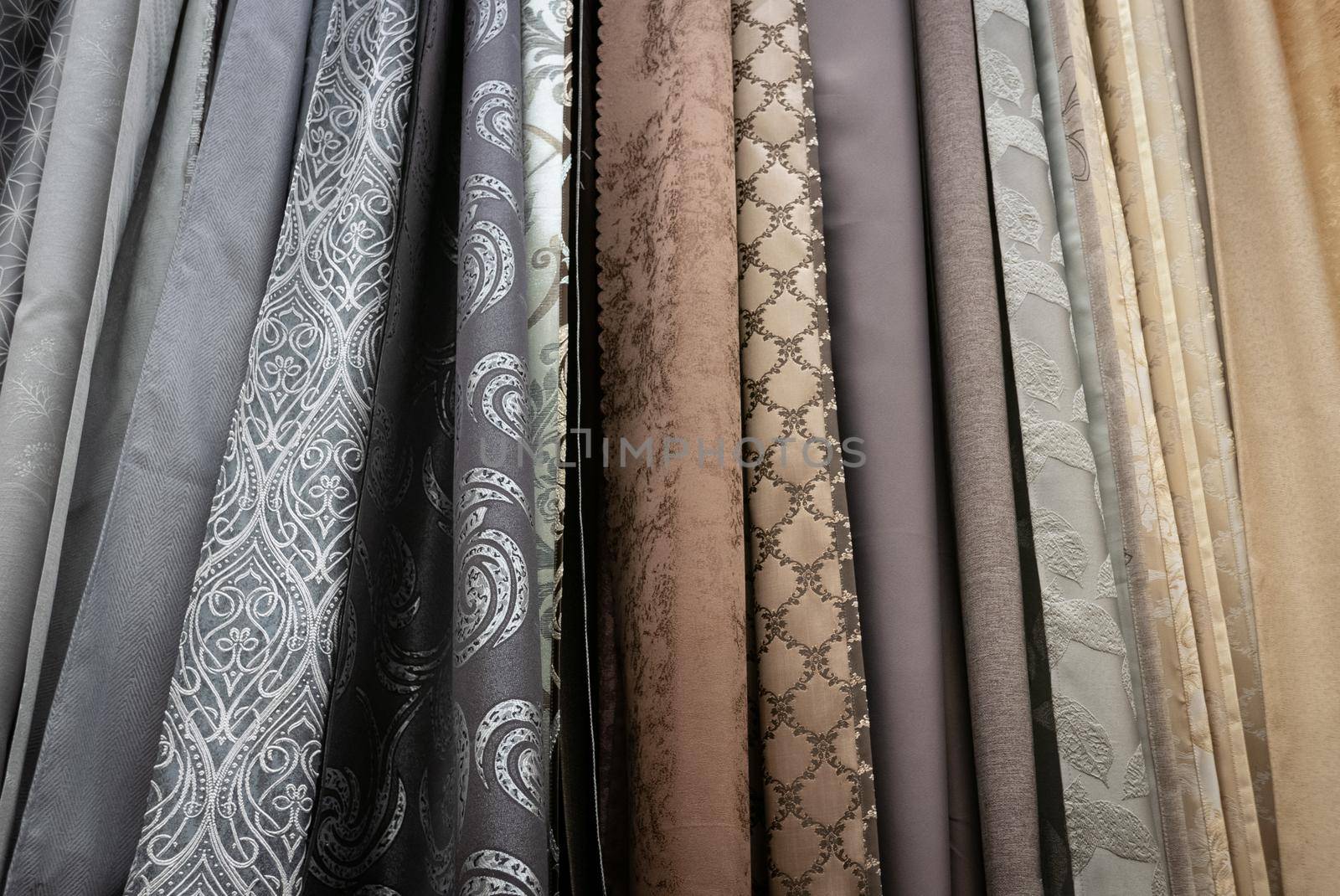 Curtains of different colors and styles in the shop.