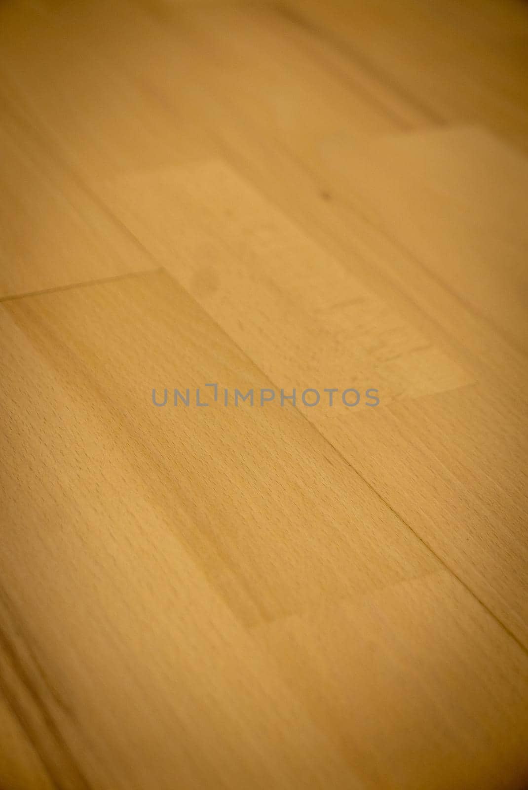 Yellow or light brown parquet texture as a background.