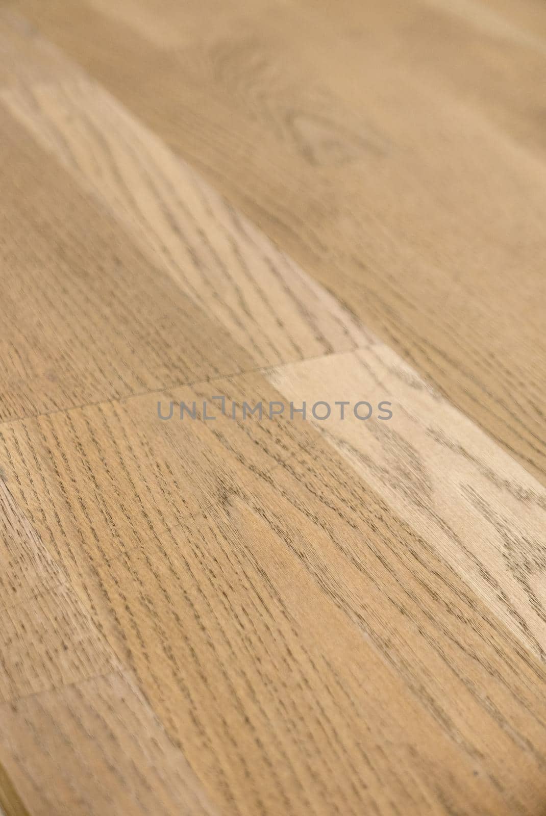 Dark brown wooden parquet floor texture as background.