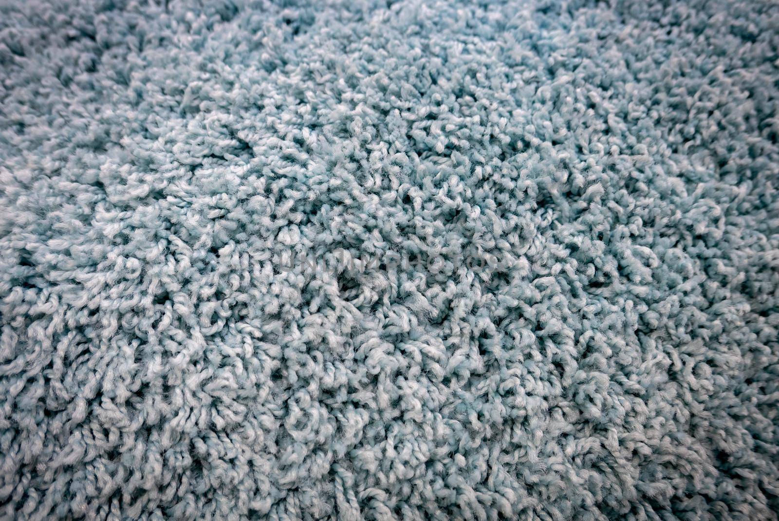 Close up view of carpet. Wall-to-wall carpeting background