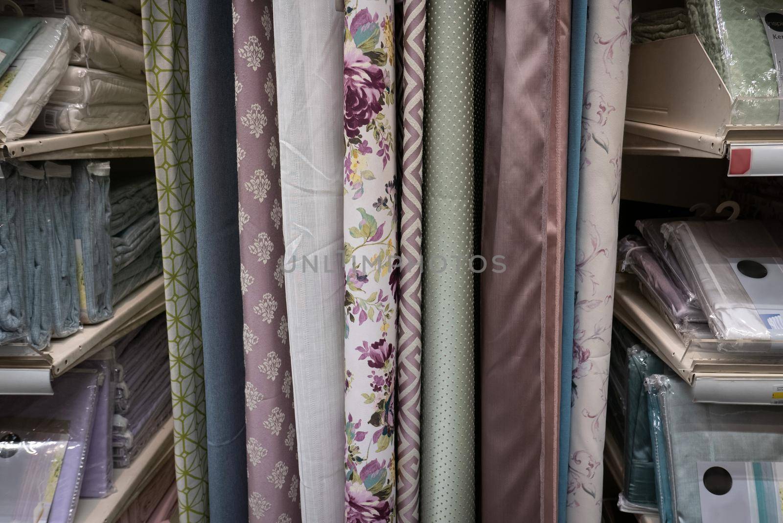 Fabric materials in a shop. Curtains at market