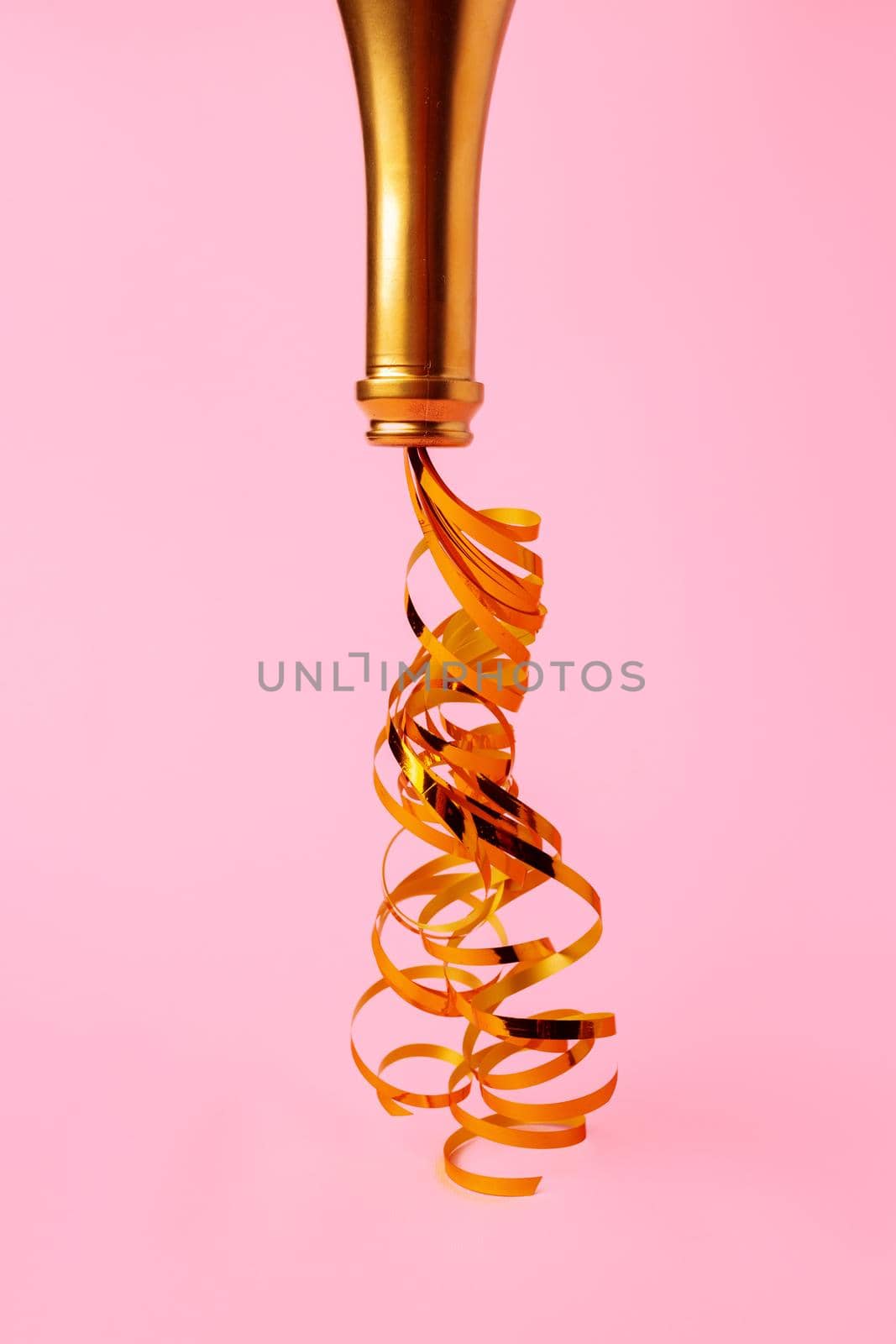 Champagne bottle with streamers flat lay top view, Christmas background