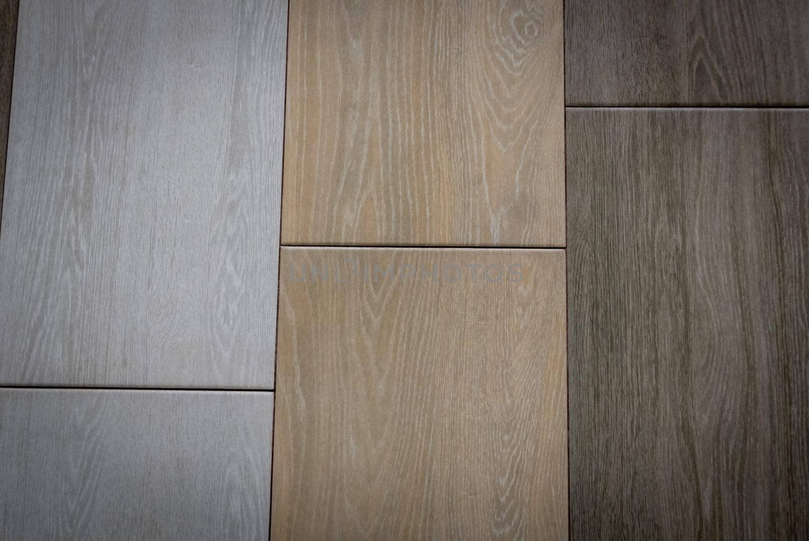 Ceramic tiles flooring - texture of natural ceramic floor decorating as wood.