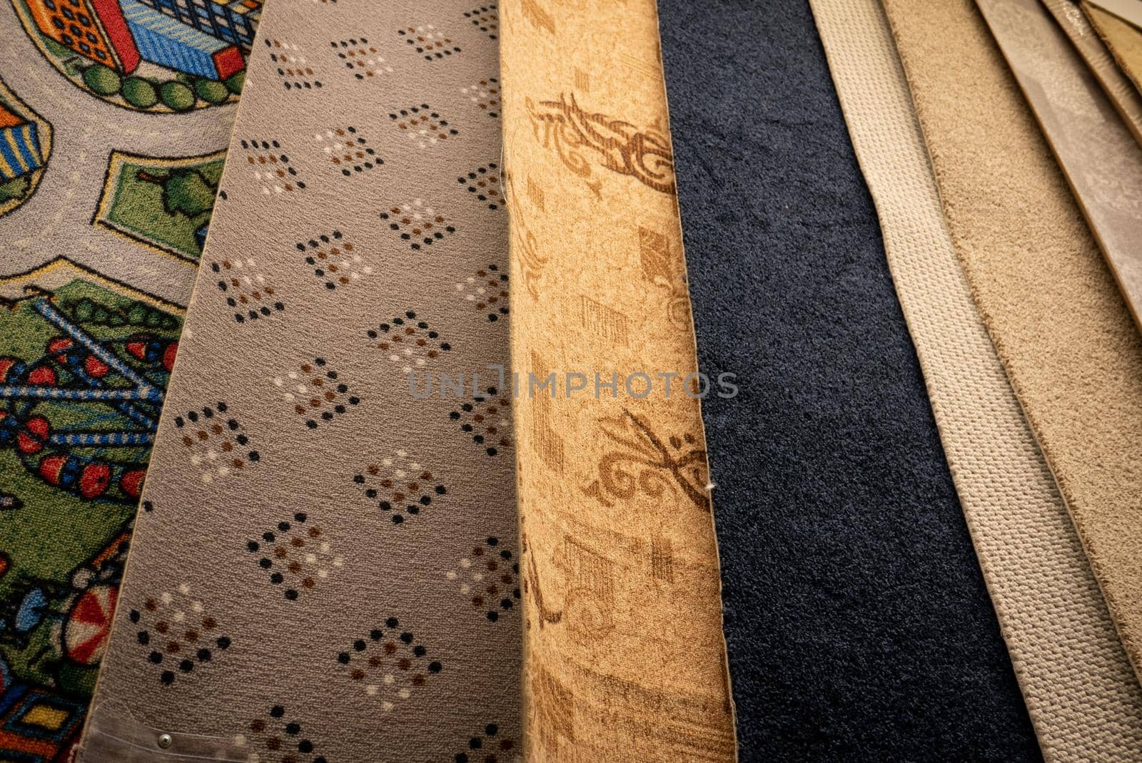 Lot of different carpets in a construction mall.