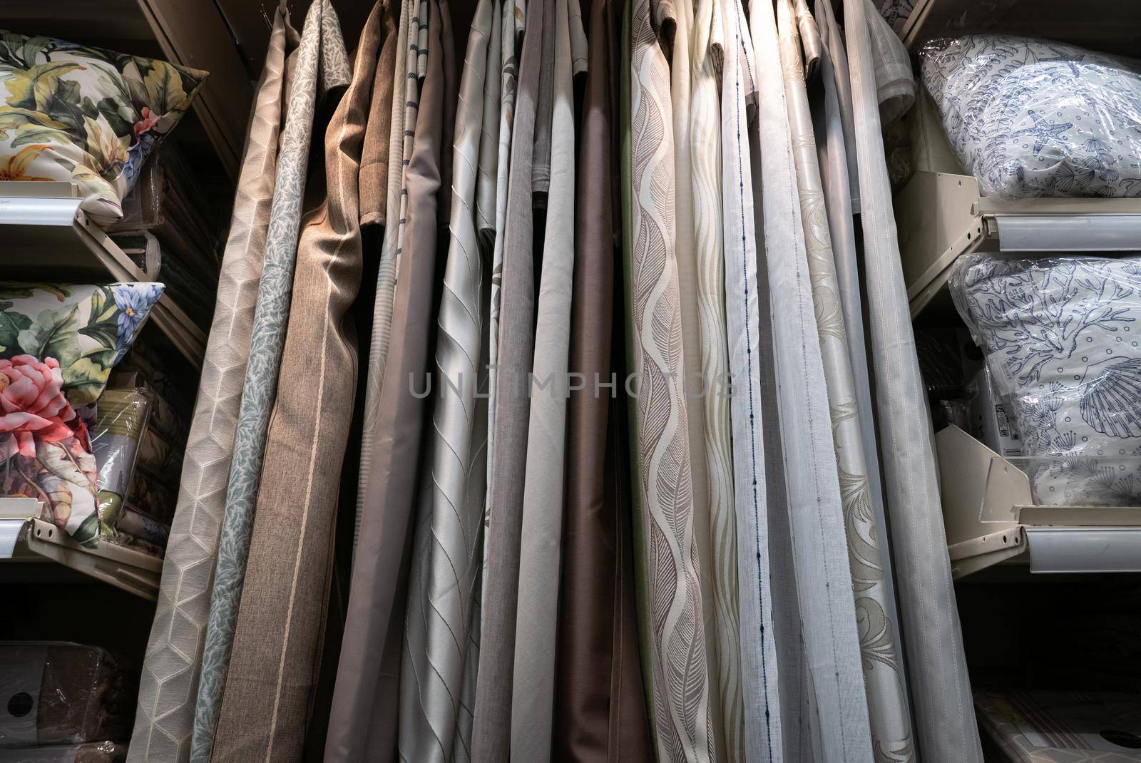 Fabric materials in a shop. Curtains at market