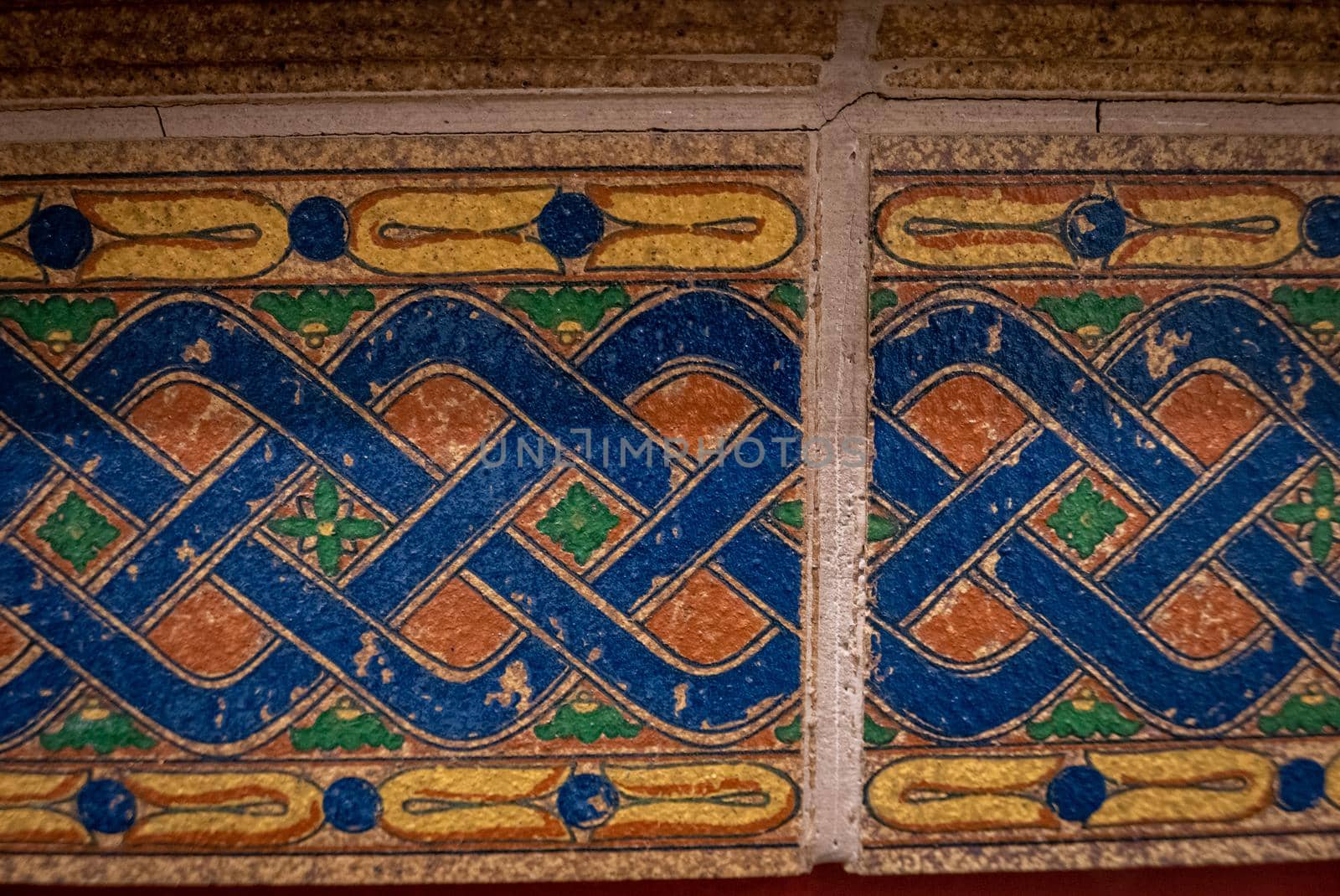 Texture of Antique ceramic tiles on the wall background.