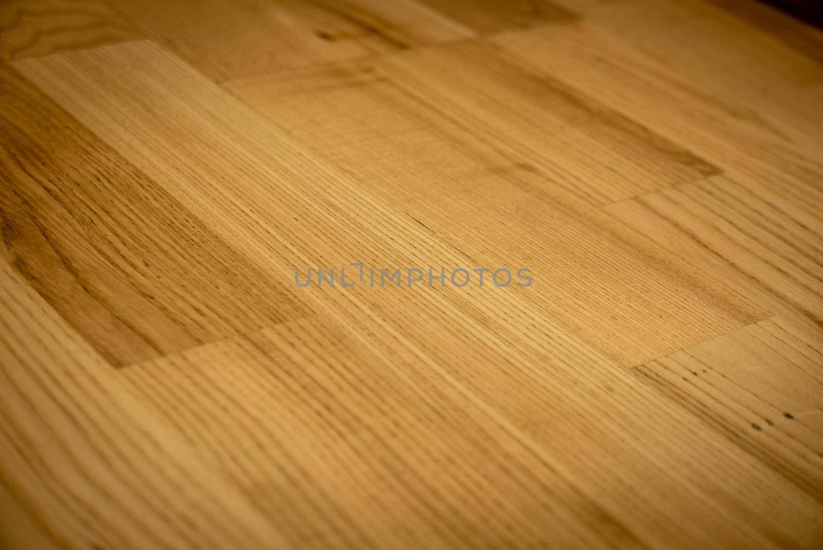 Yellow or light brown parquet texture as a background.